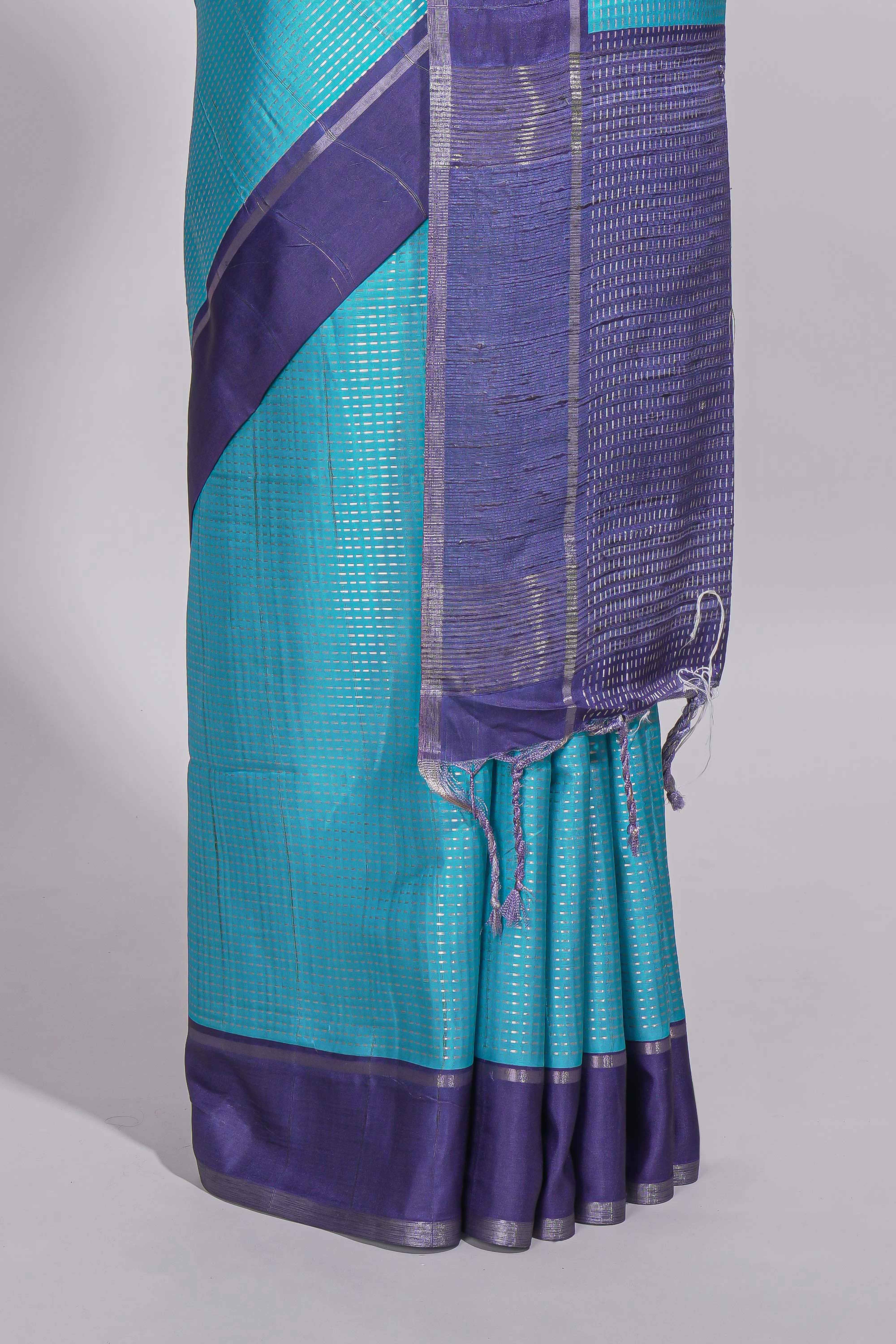 Aqua blue tussar saree with woven checks by rich purple border and matching zari woven pallu with matching blouse piece - Image 4