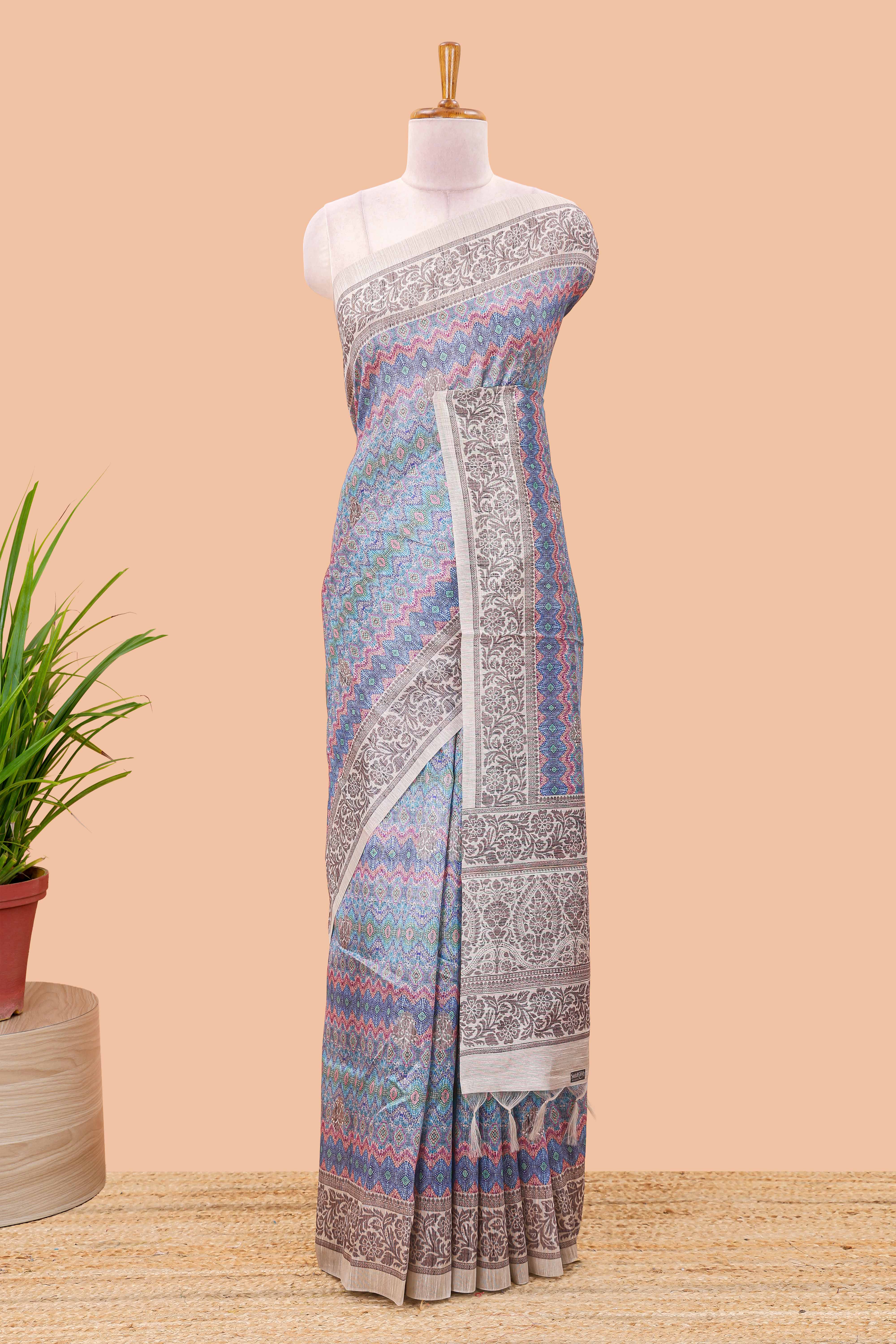Blue chanderi cotton saree featuring ikkat style jaal print and contrast floral border and pallu - Image 2