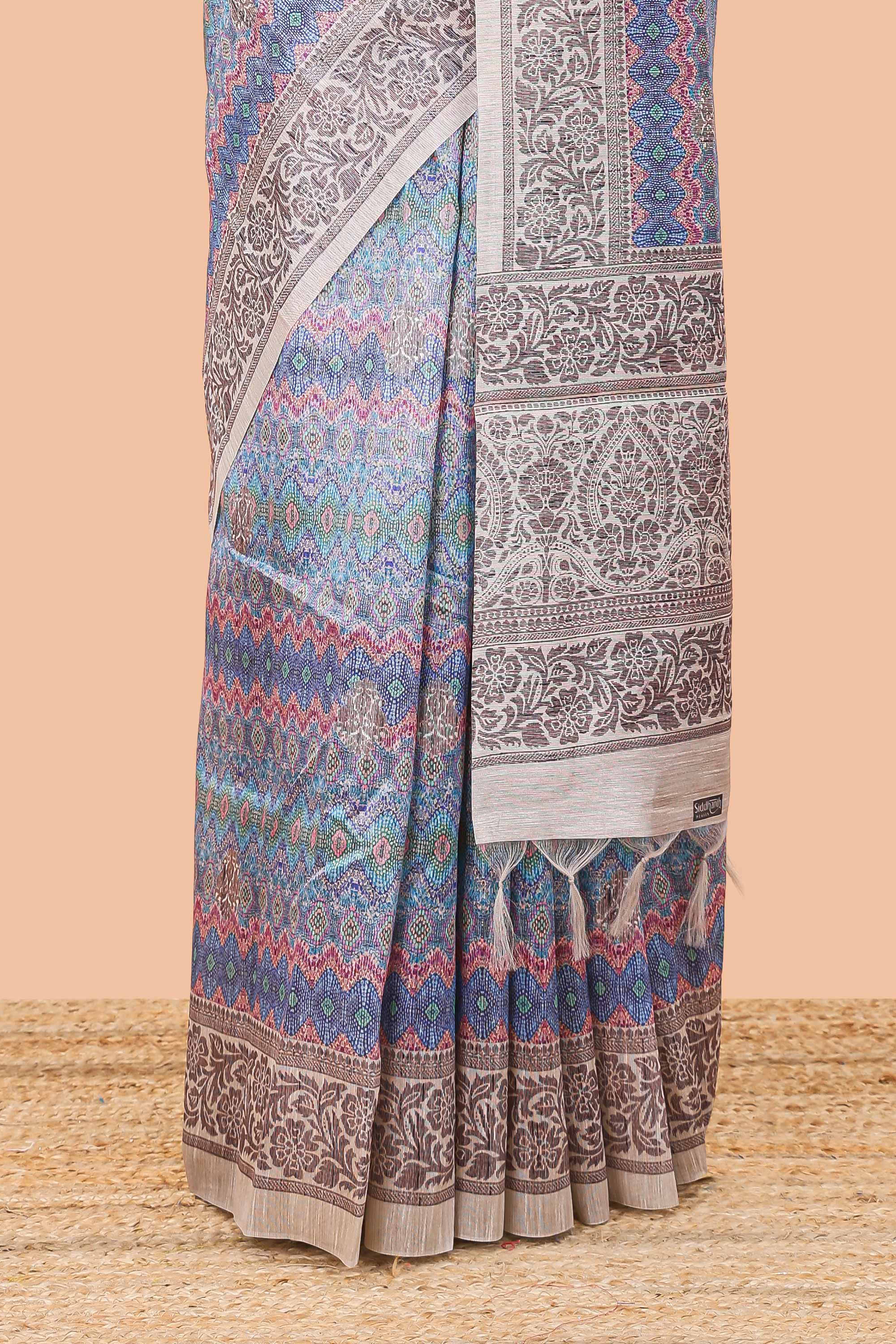 Blue chanderi cotton saree featuring ikkat style jaal print and contrast floral border and pallu - Image 4