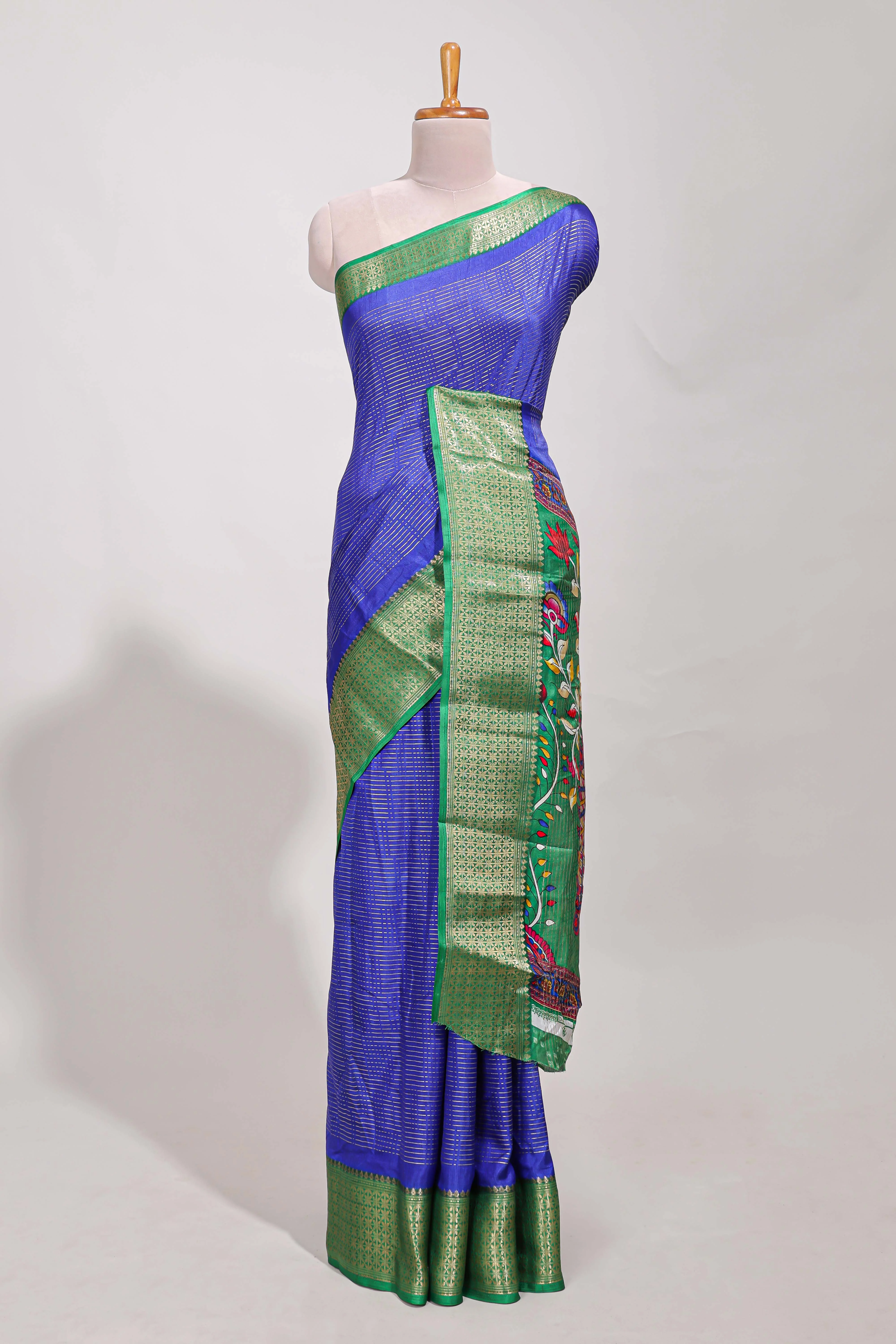 Blue Dola silk saree all over zari work design with contrast zig zag border and contrast kalmkari printed pallu