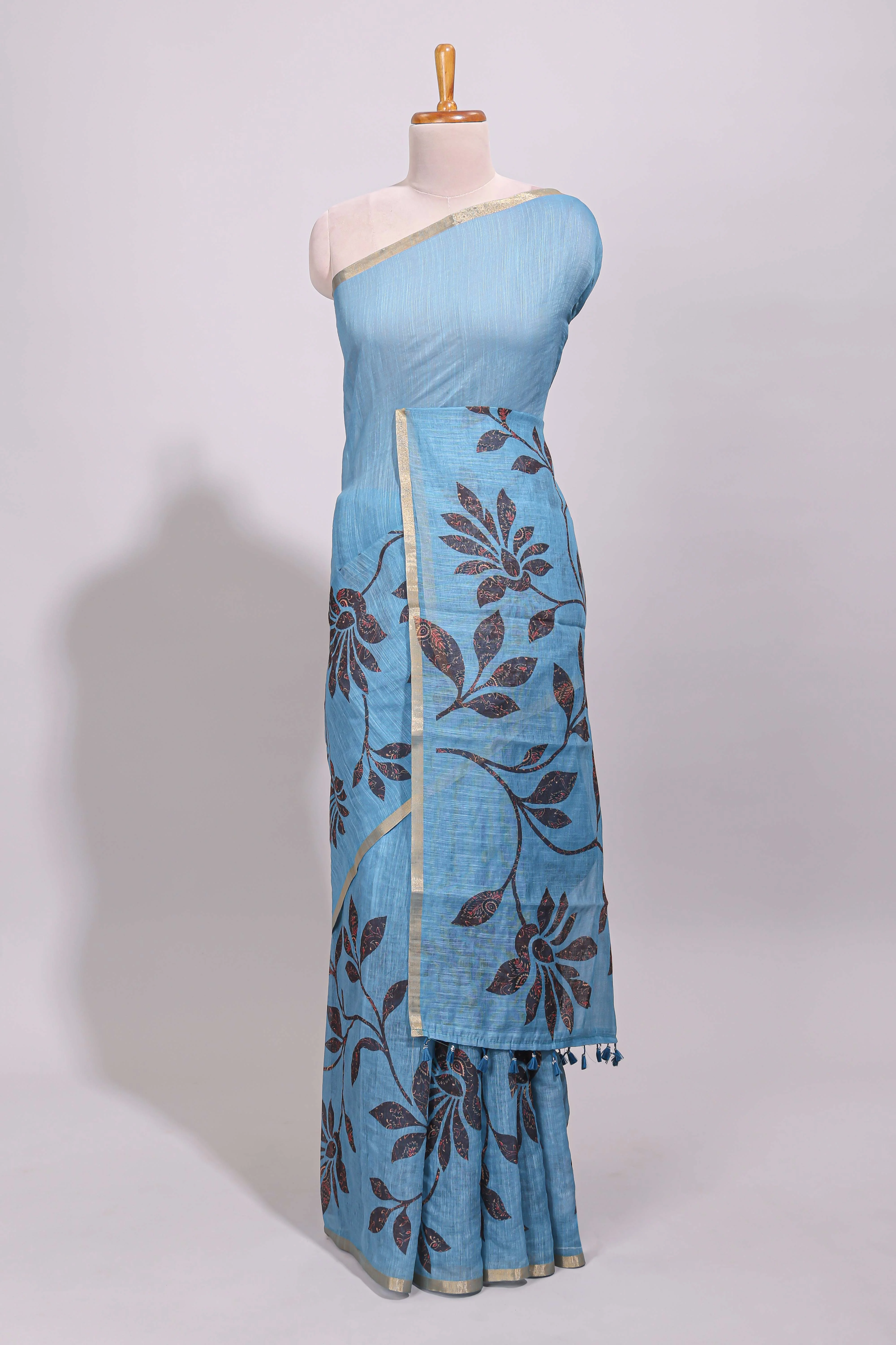 Blue floral design linen cotton saree with self zari border and contrast printed blouse - Image 2