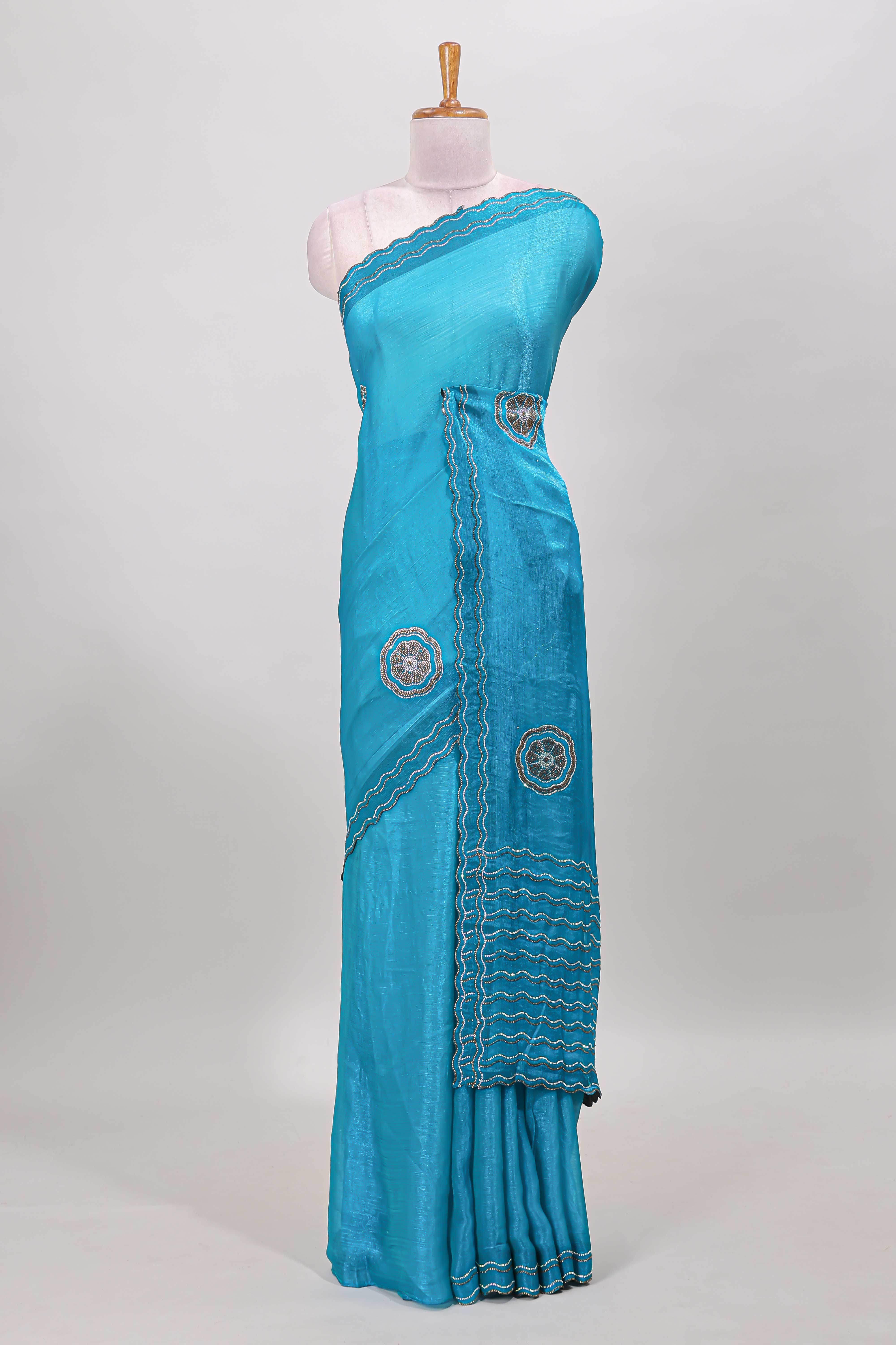Blue floral stone work motifs semi chiffon saree with self scallop border and matching blouse - Image 2