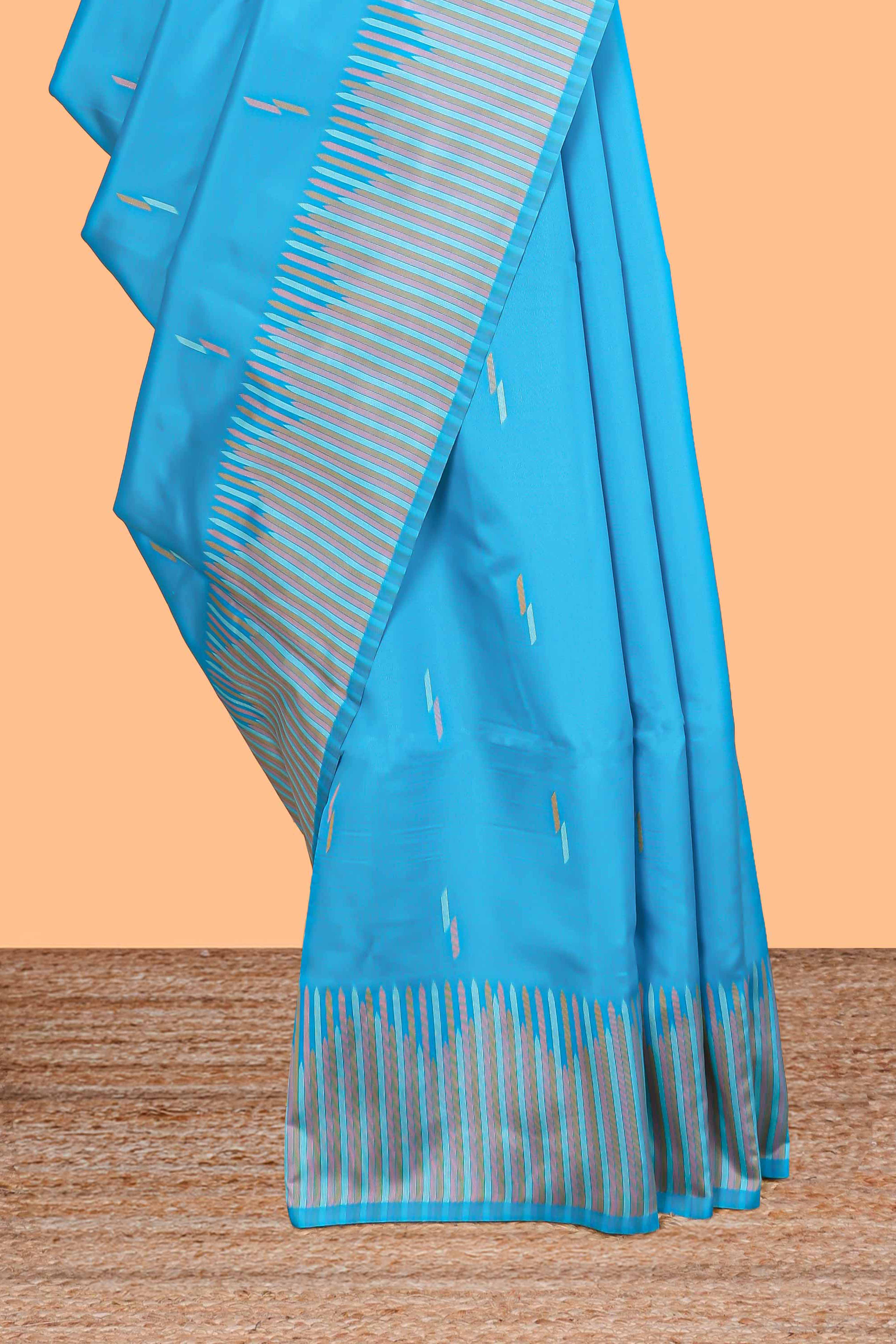 Blue geometric style motifs litchi silk saree with contrast striped border and blouse - Image 3
