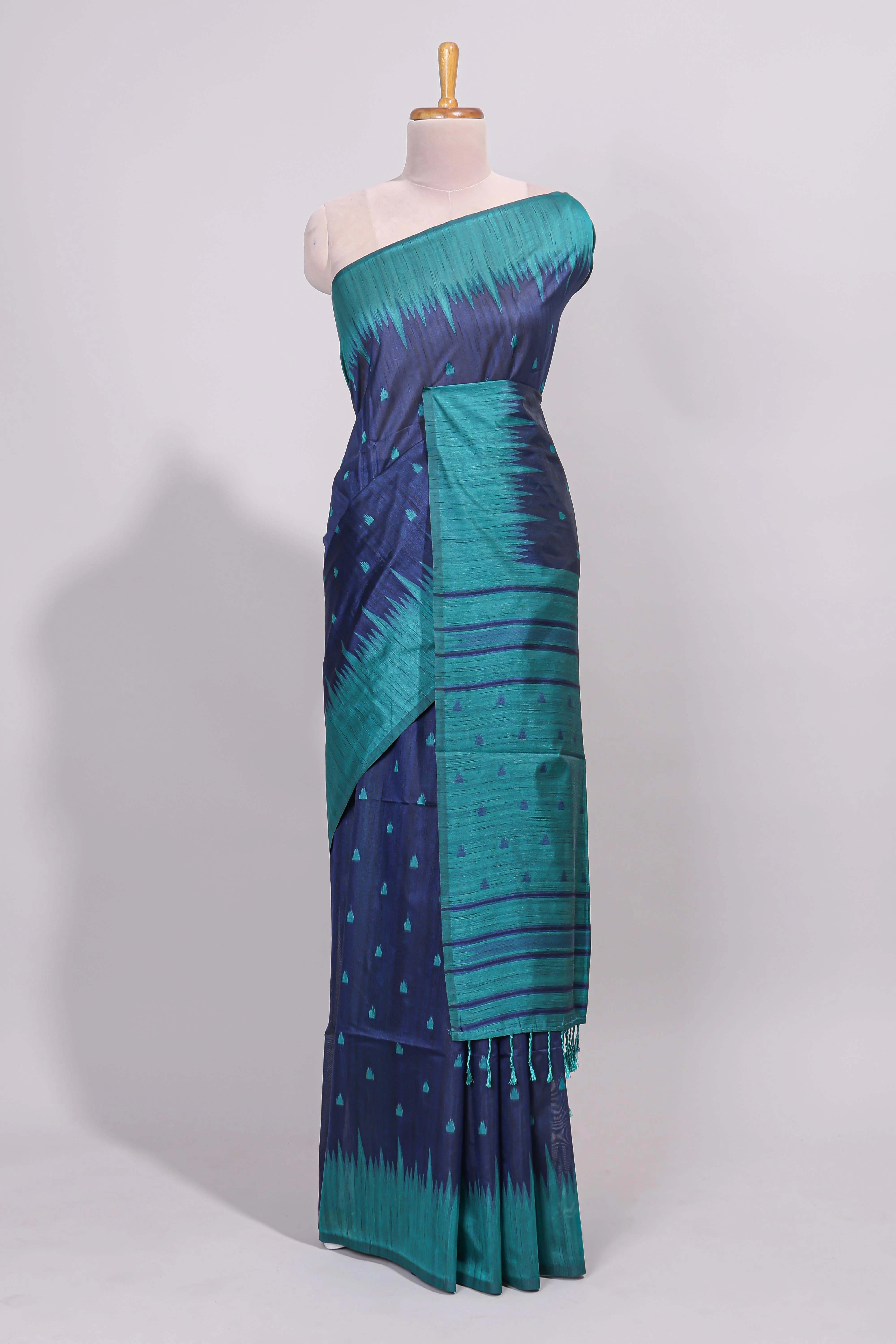 Blue ikkat motifs design semi tussar saree with contrast border and striped blouse - Image 2
