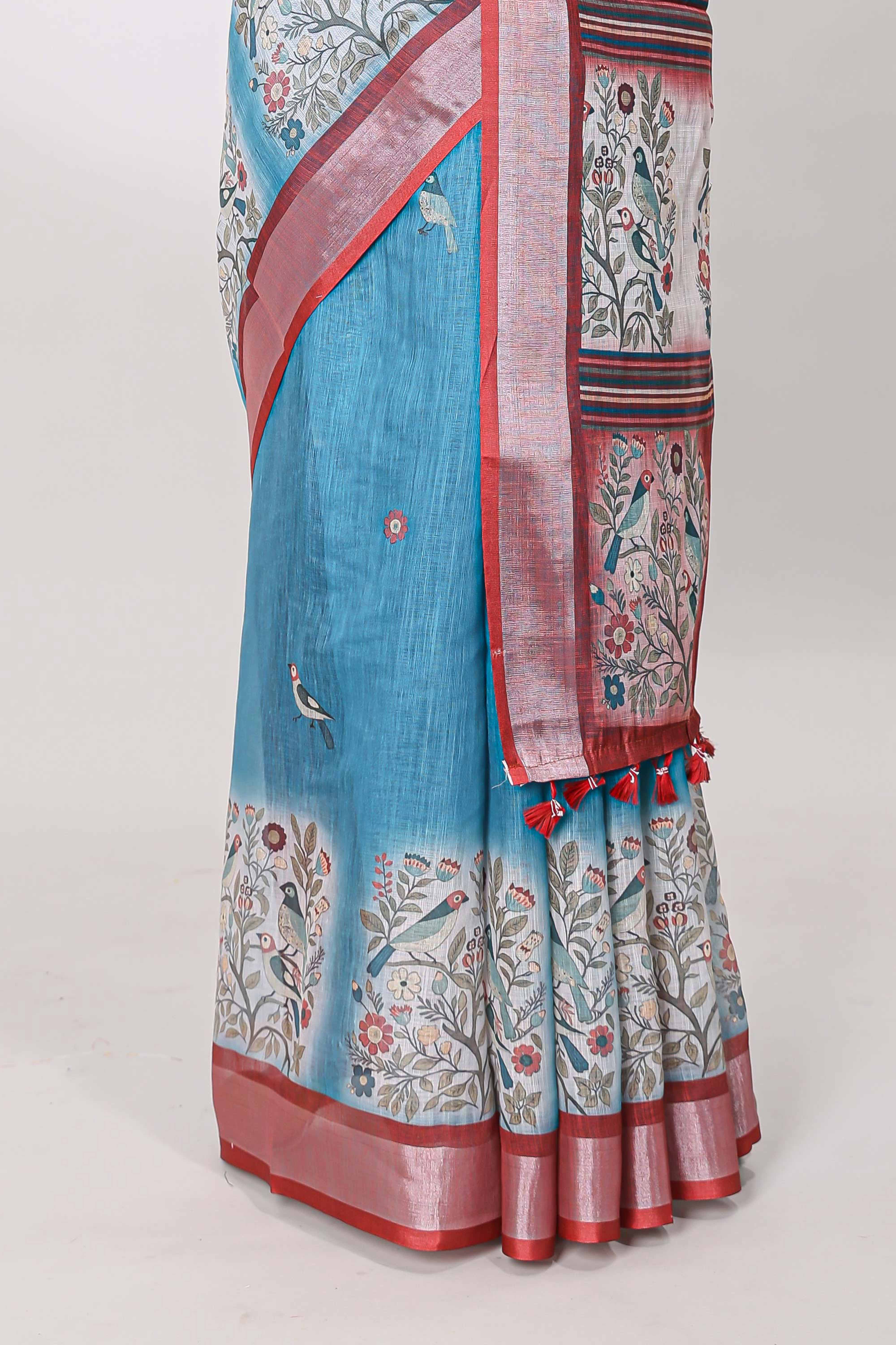 Blue linen cotton saree with tiny birds and floral motifs and contrast silver zari border and blouse - Image 4