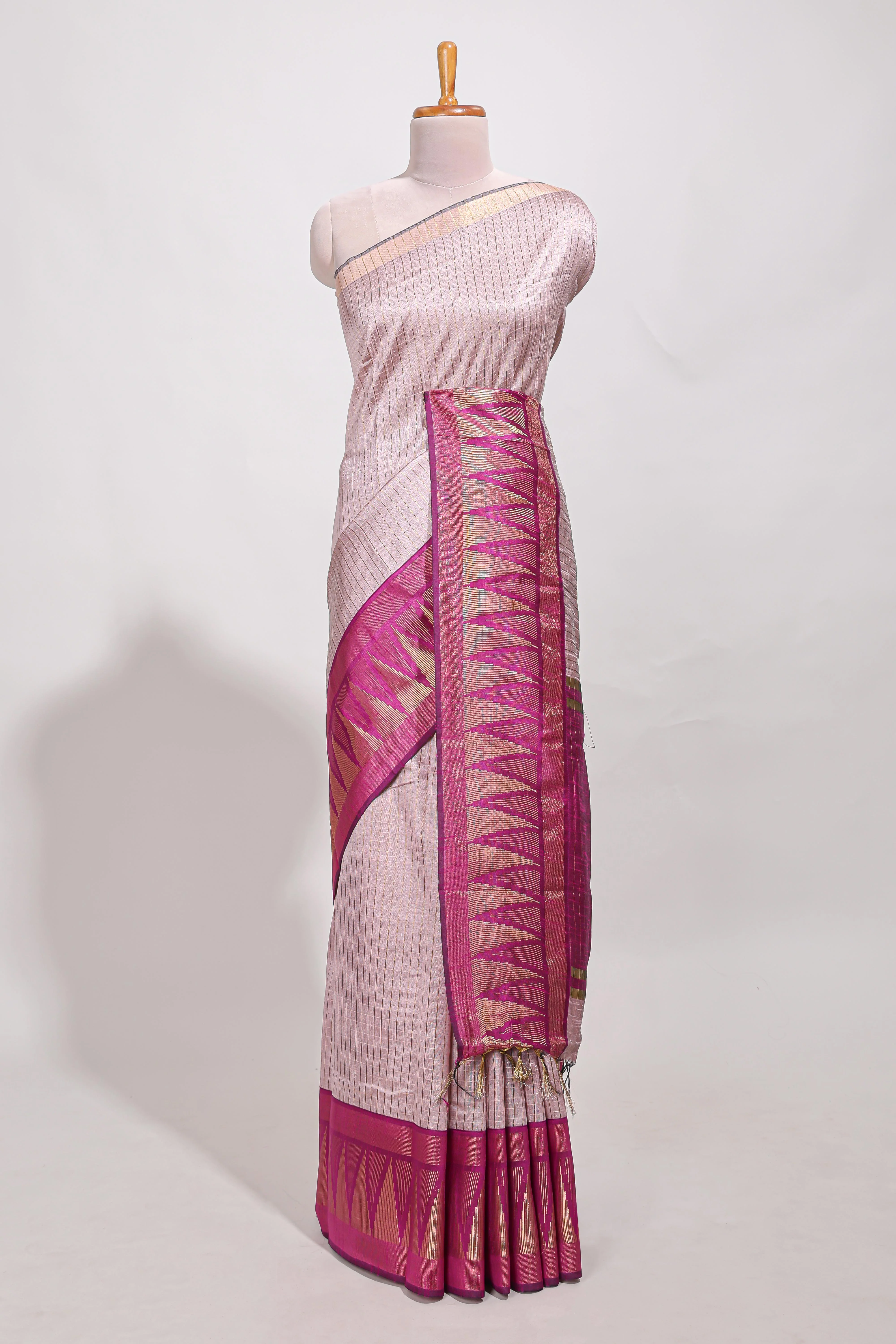 Peach semi tussar saree all-over fine checked zari with border geometric zig-zag metallic weaving and contrast blouse