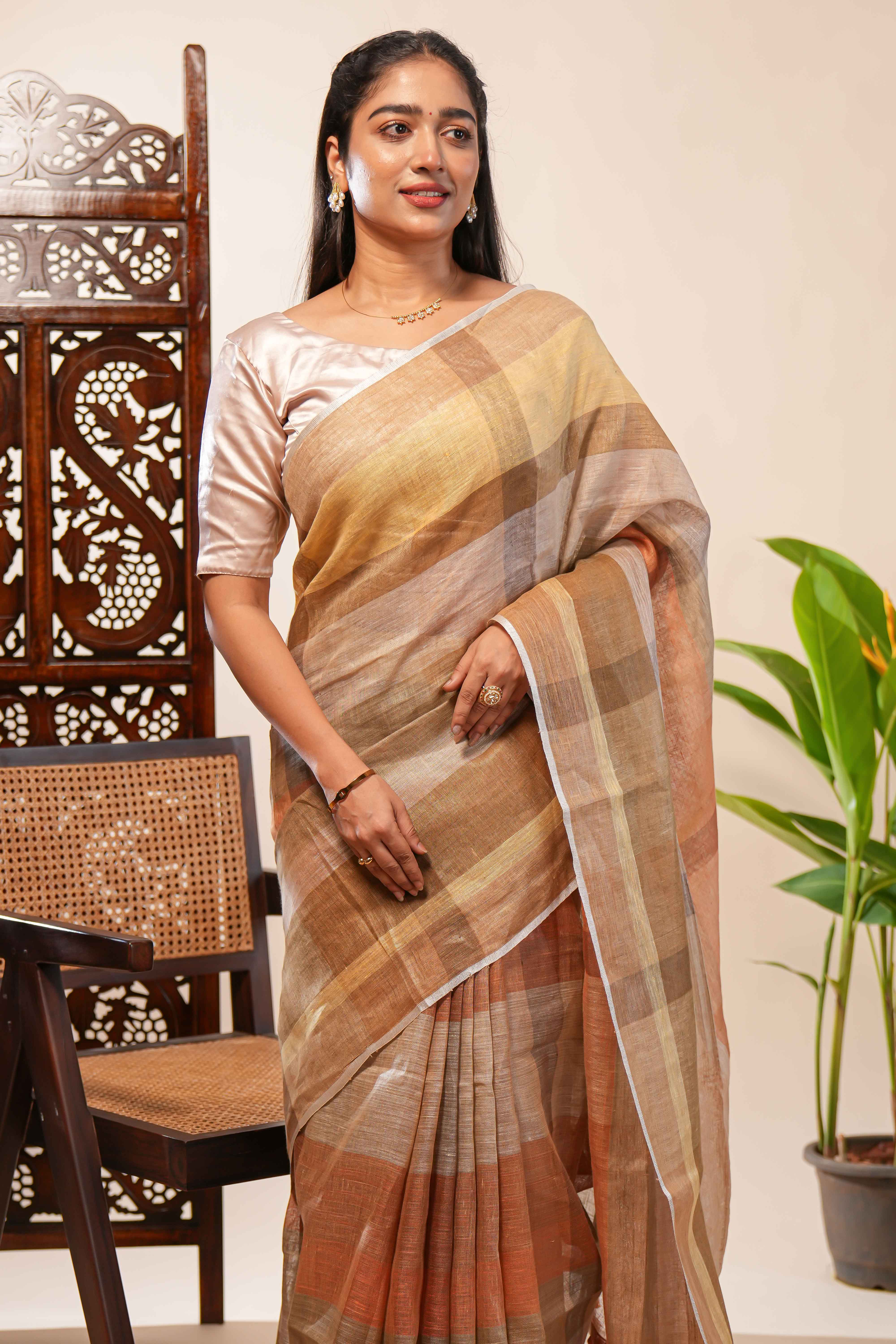 Brown Tones semi tussar all over saree Subtle Stripe and Checked pattern along with Tassels and Contrast Blouse - Image 3