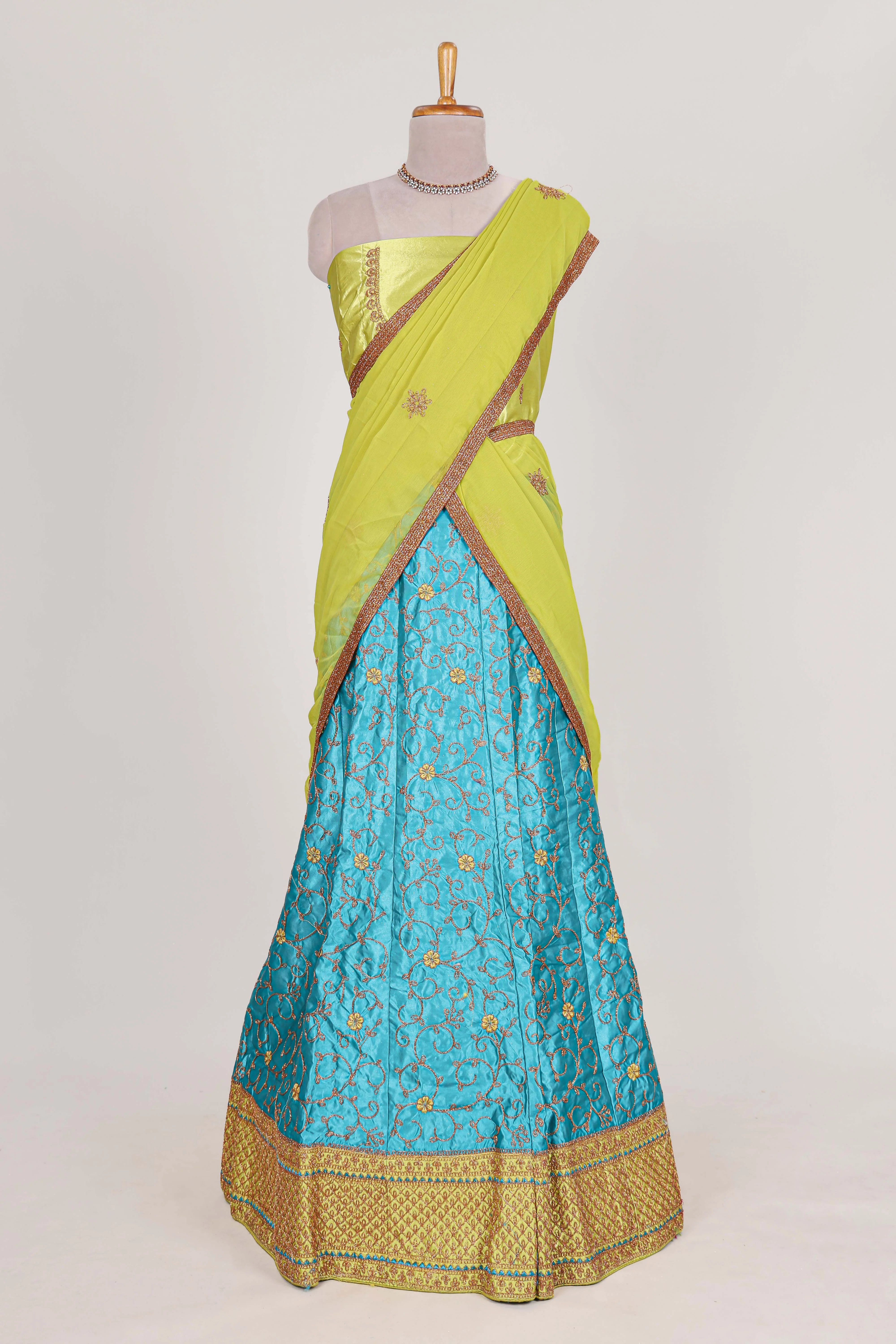 Blue and yellow satin lehenga embroidery with a beautiful contrast border paired with a matching embroidered blouse