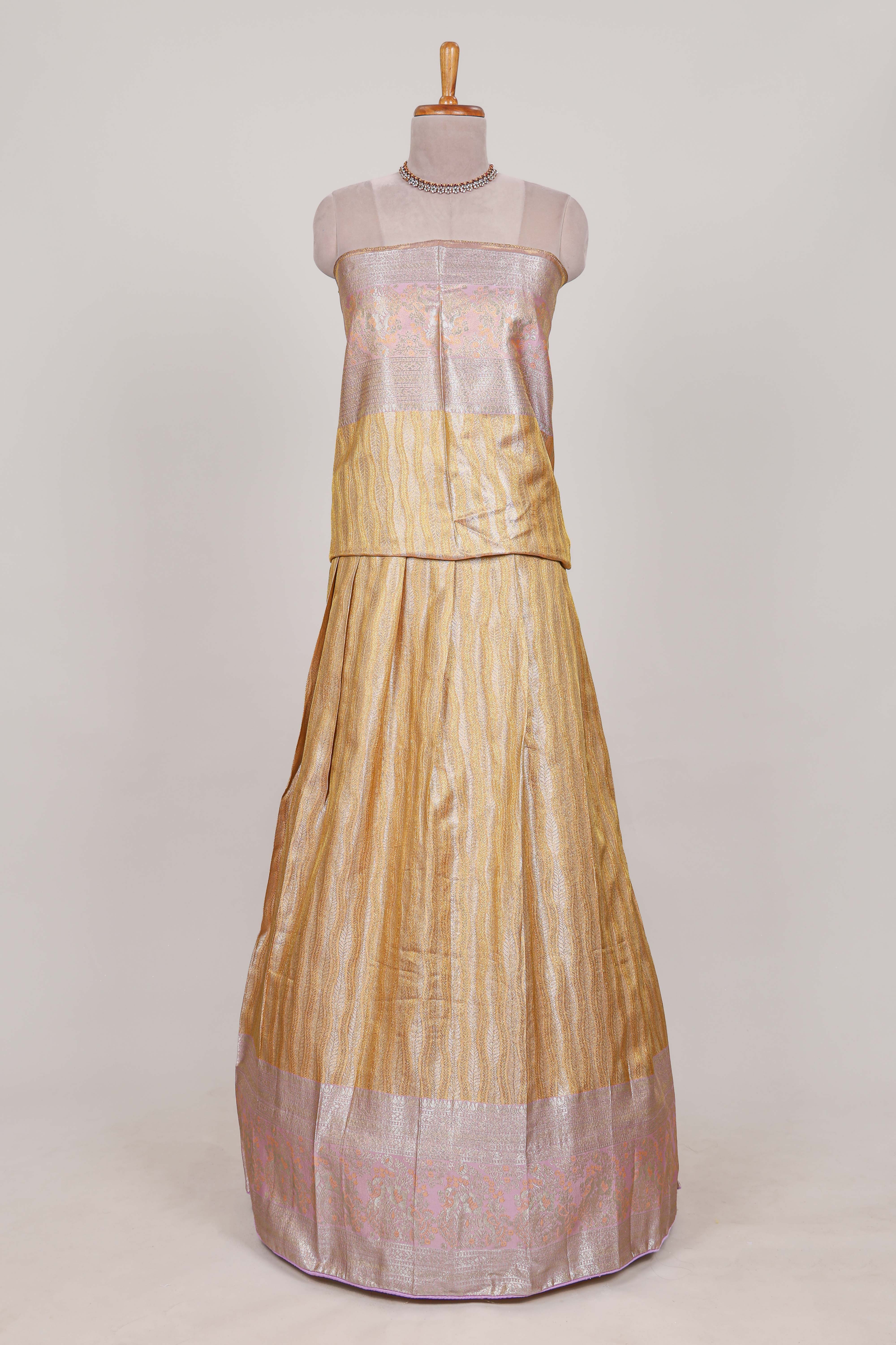 Cream tissue lehenga featuring elegant vertical line patterns with a beautiful contrast border Paired with a matching shawl - Image 2