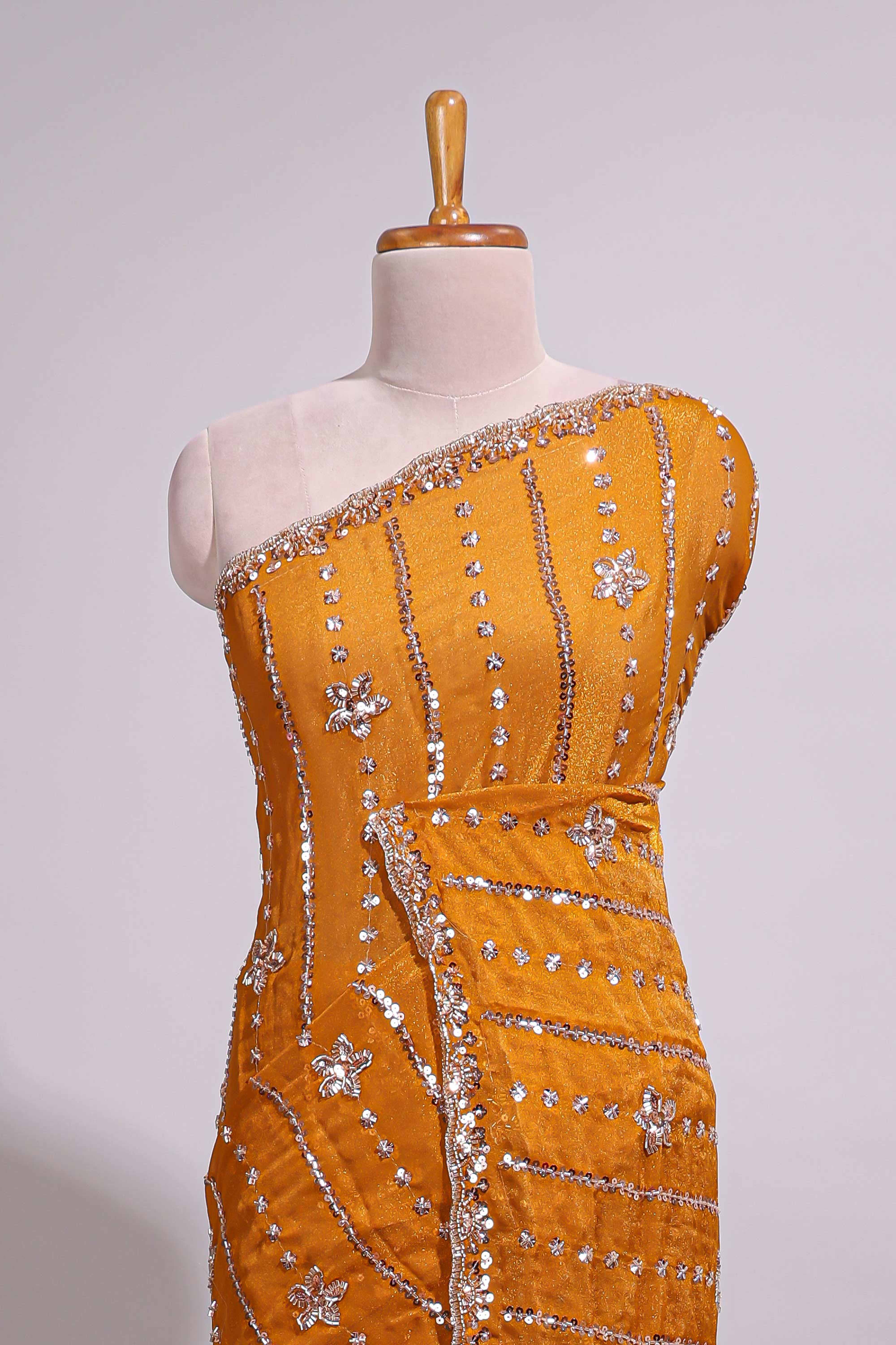 Mustard yellow saree with silver sequin vertical lines floral motifs embellished border and matching pallu design along with matching blouse - Image 3