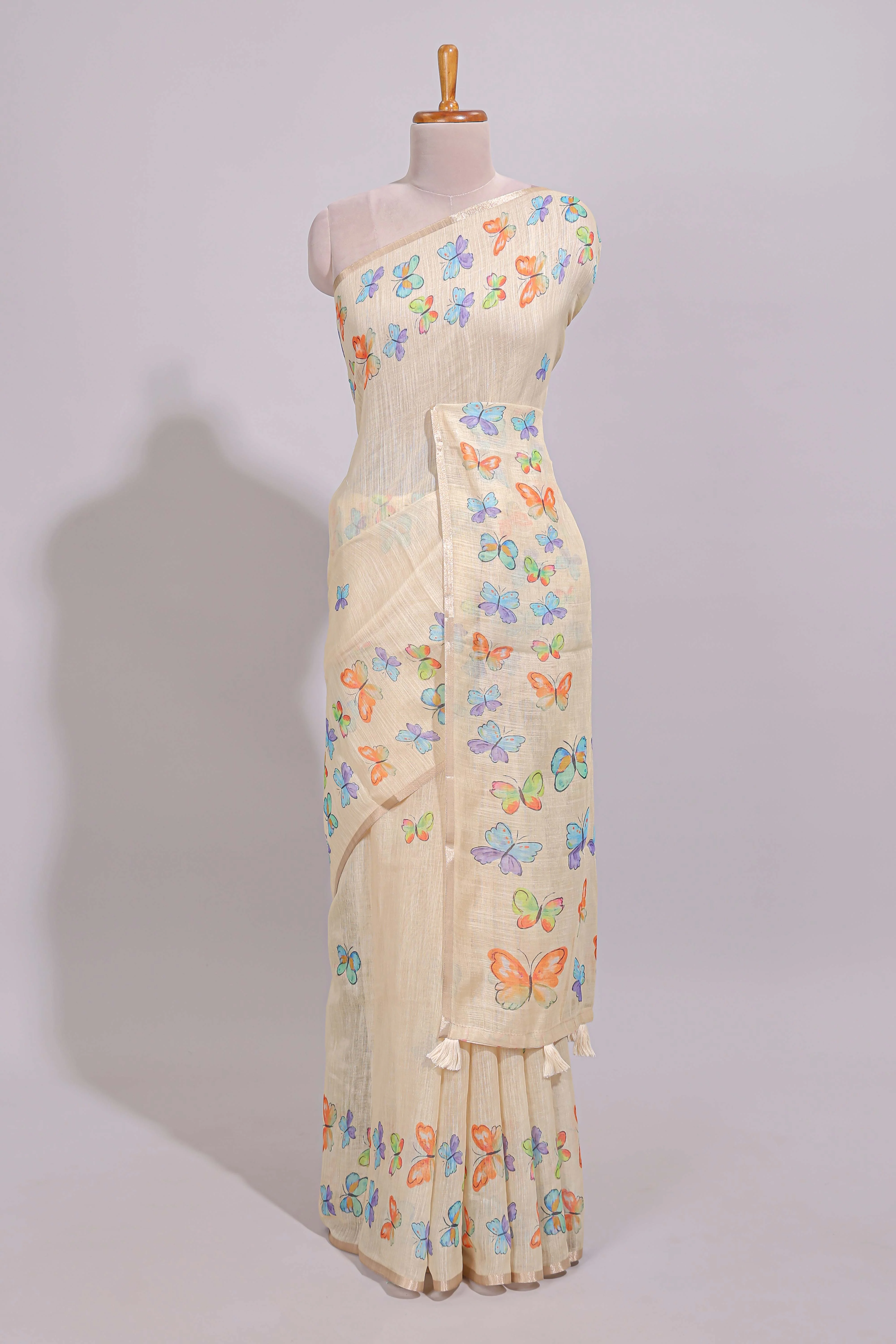 Cream butterfly motifs linen cotton saree with self zari border and matching printed blouse - Image 2