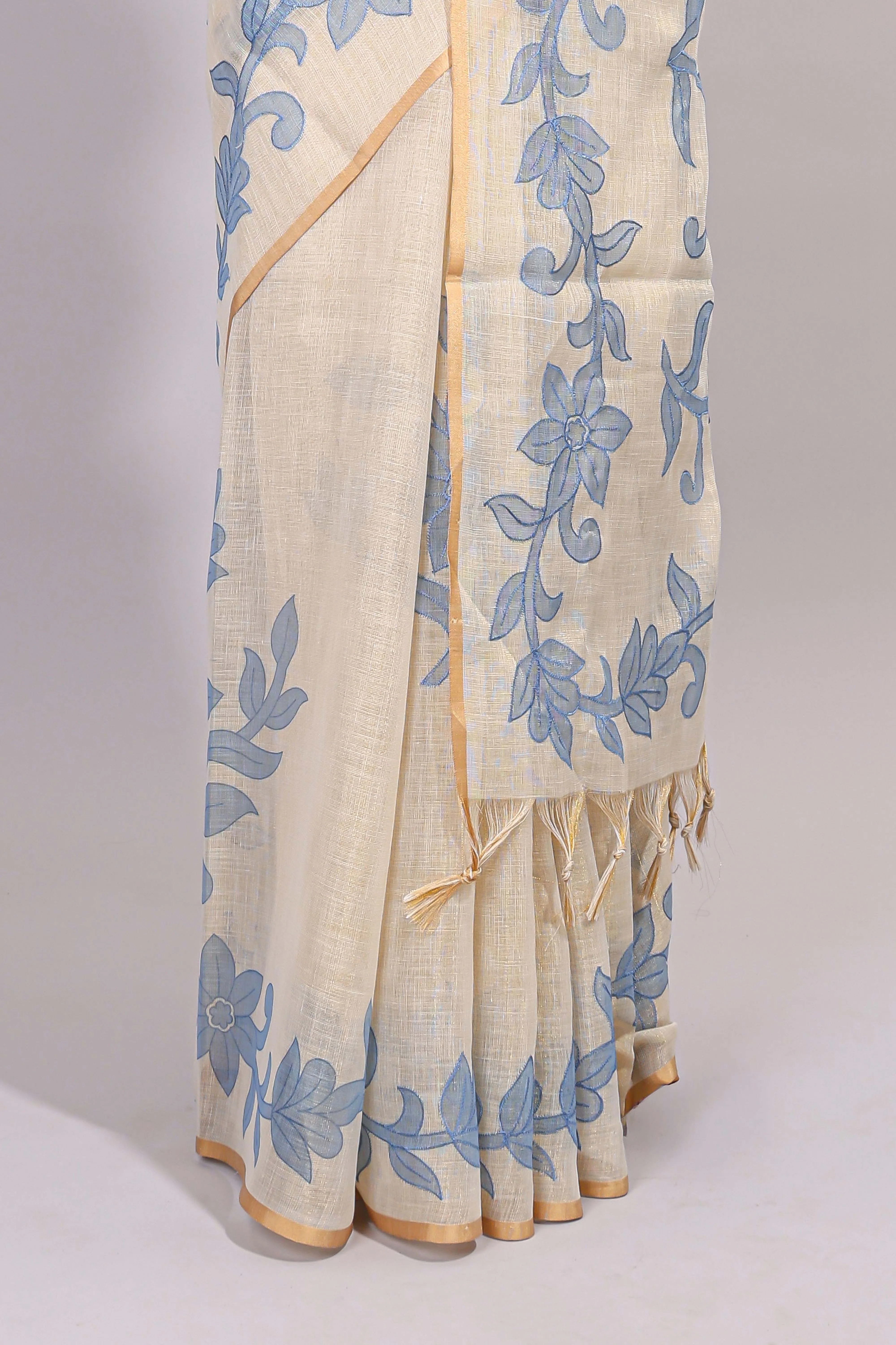 Cream floral design linen cotton saree with self zari border and matching printed blouse - Image 6