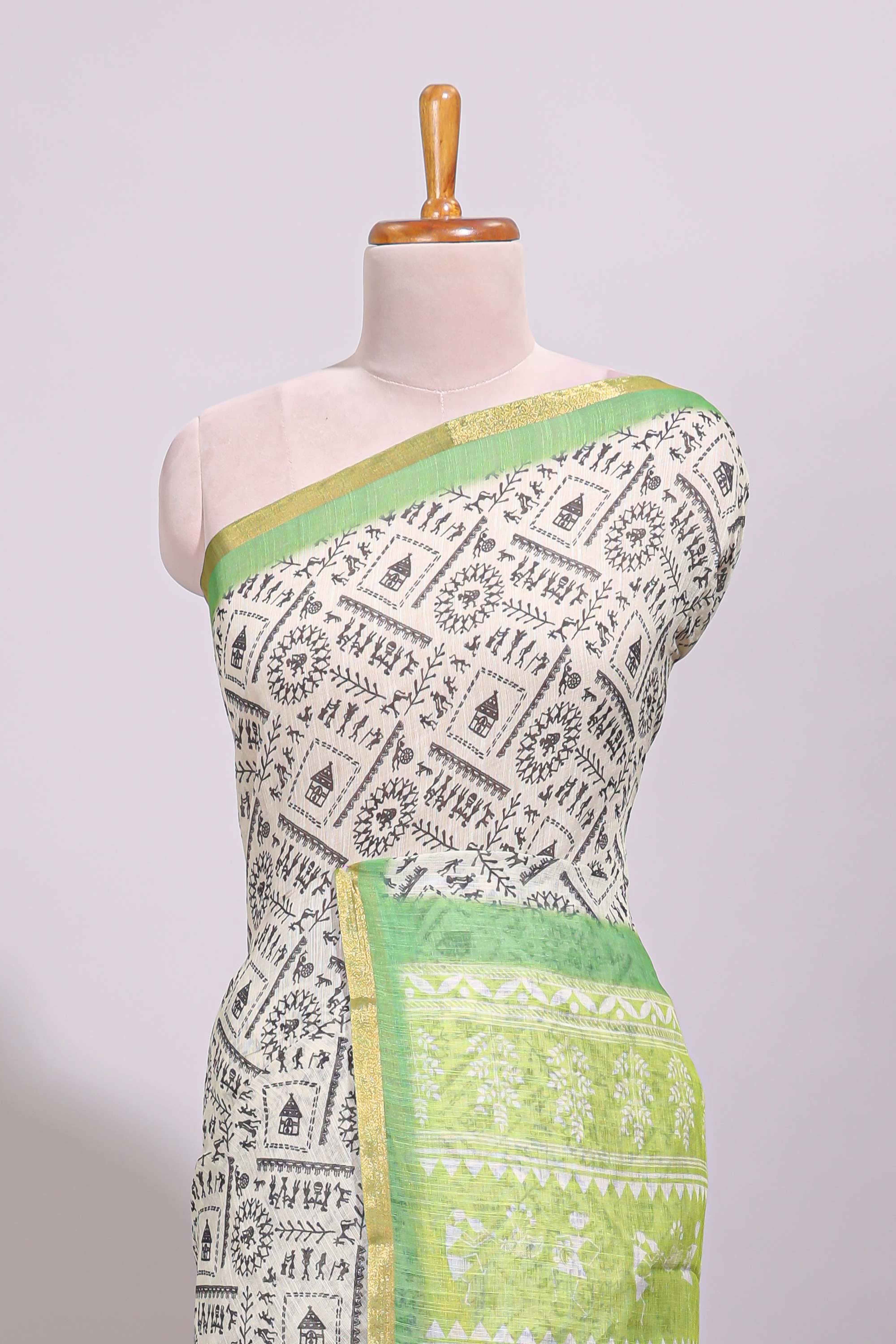 Cream warli design linen cotton saree with contrast zari border and printed blouse - Image 3