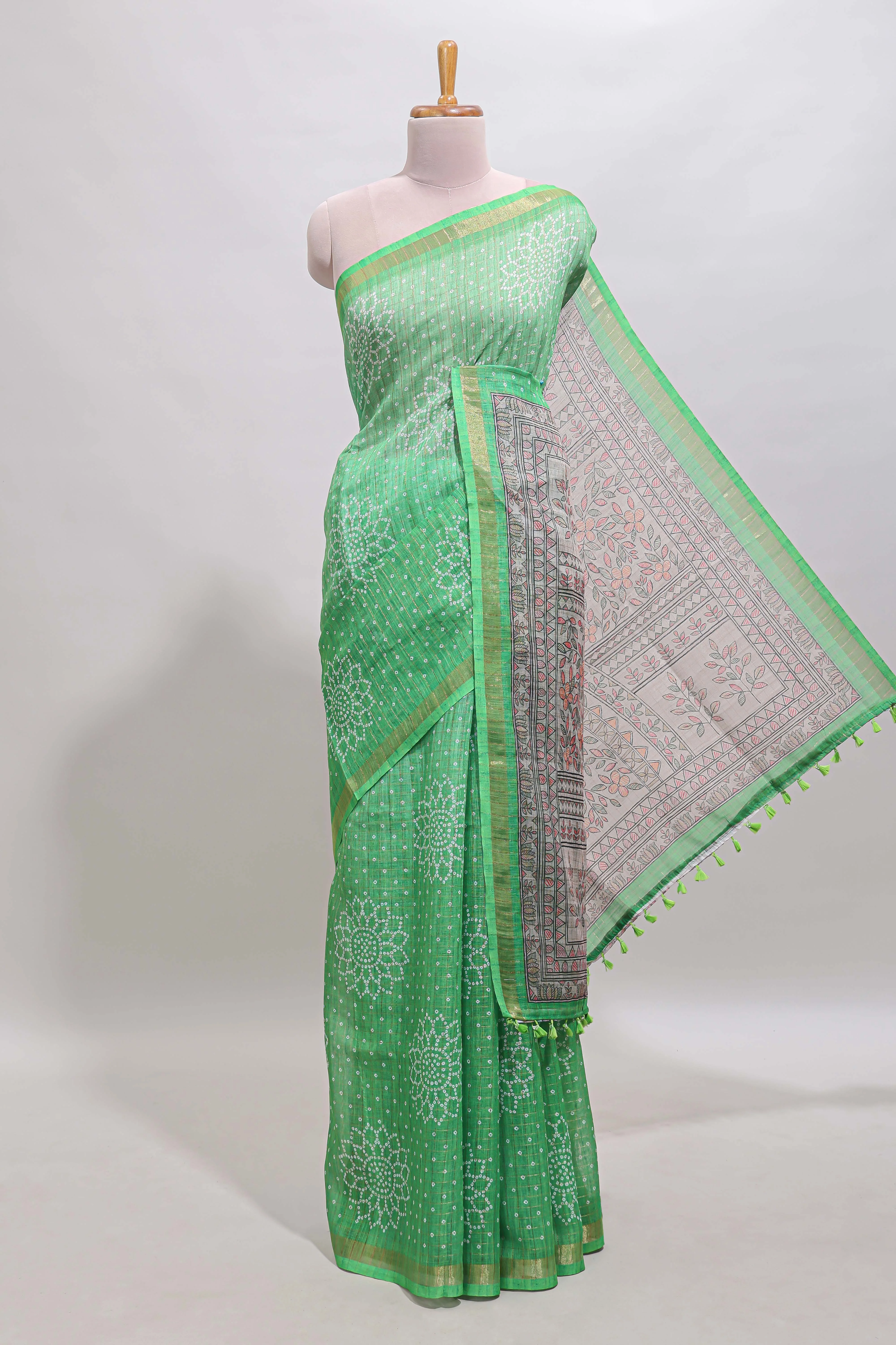 Green bhandhini style floral design chanderi cotton saree with self zari border and contrast printed blouse