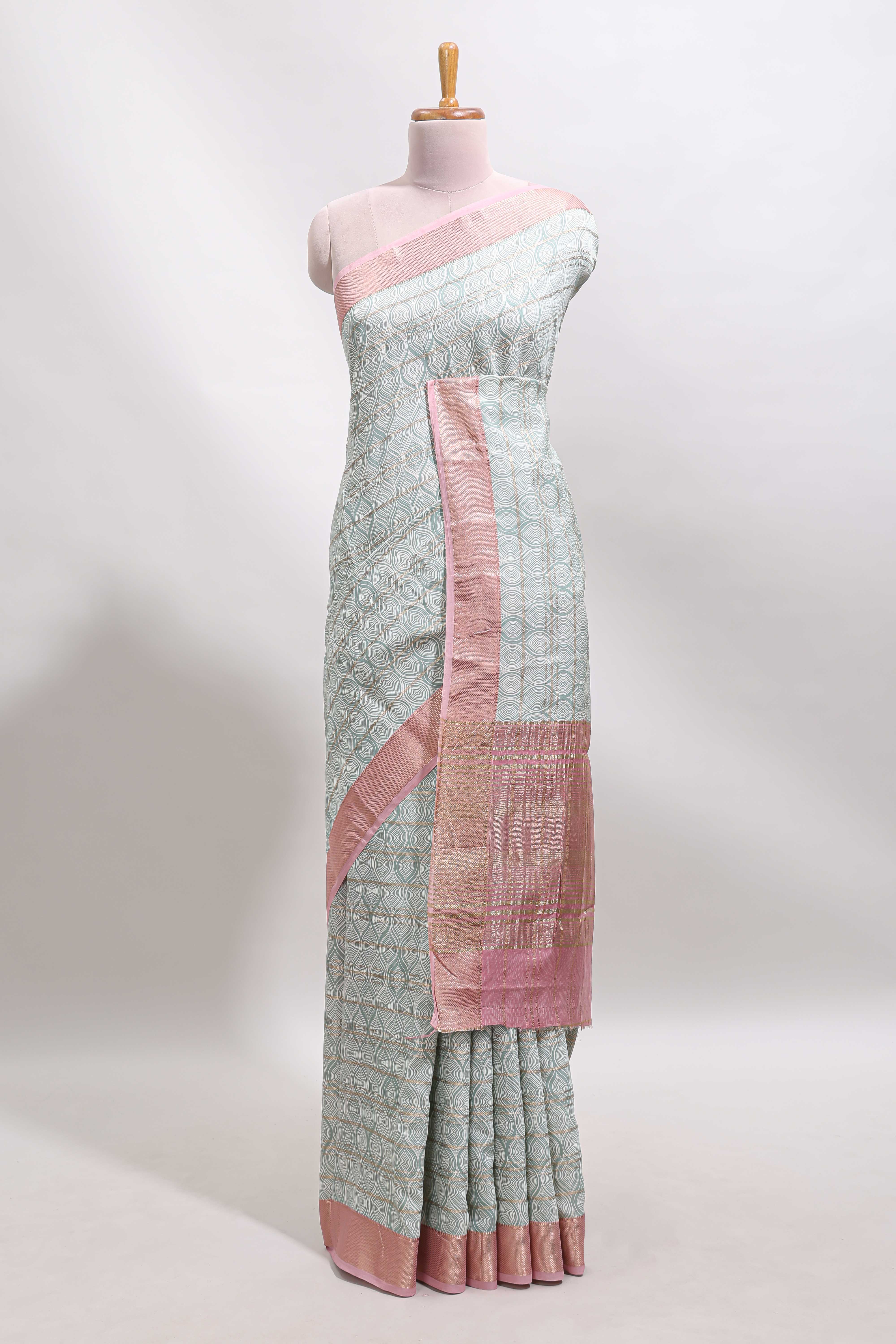 Green geometric design tussar saree with contrast zari border and striped blouse - Image 2