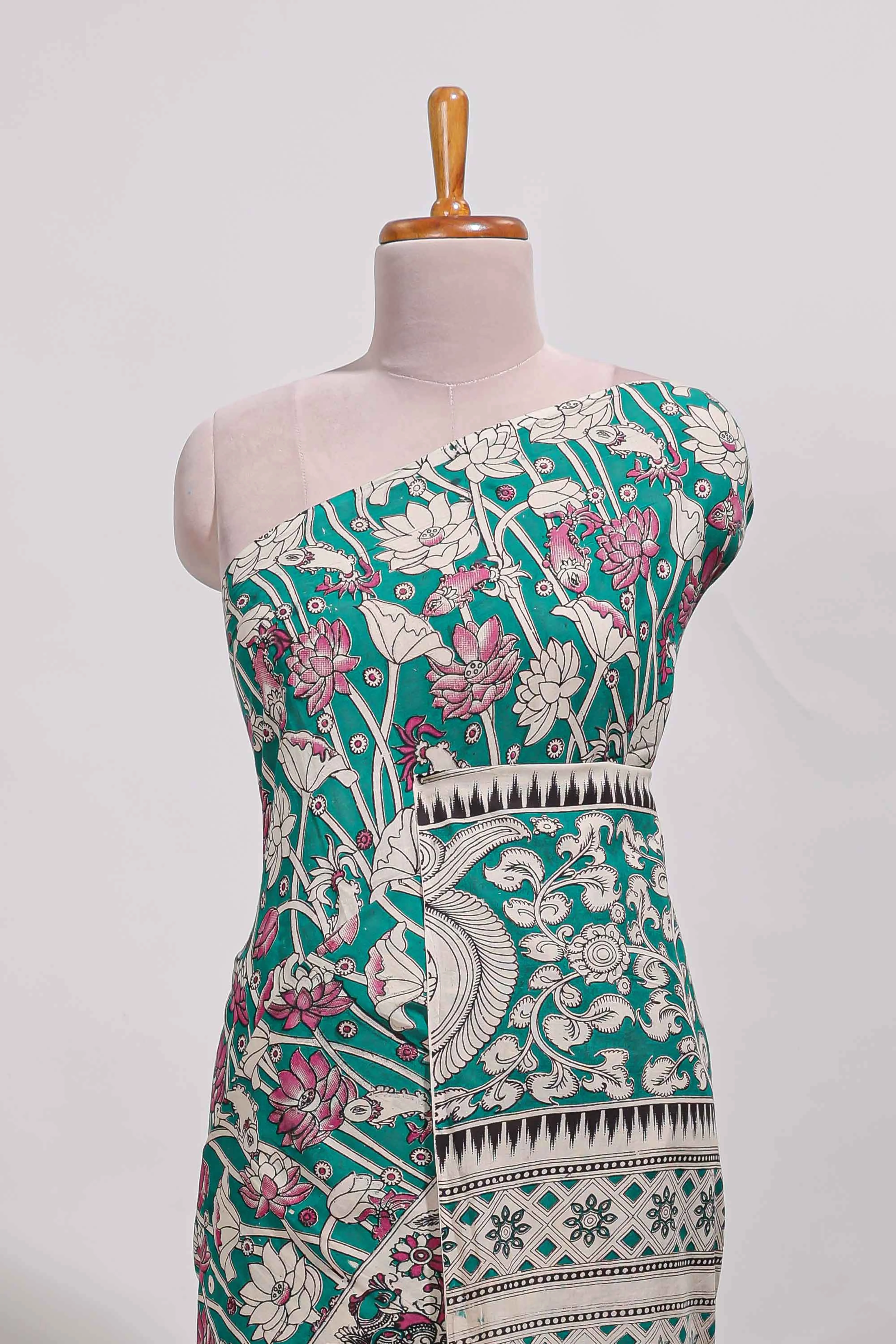 Green kalamkari printed cotton saree with traditional floral motifs and contrast pallu - Image 3