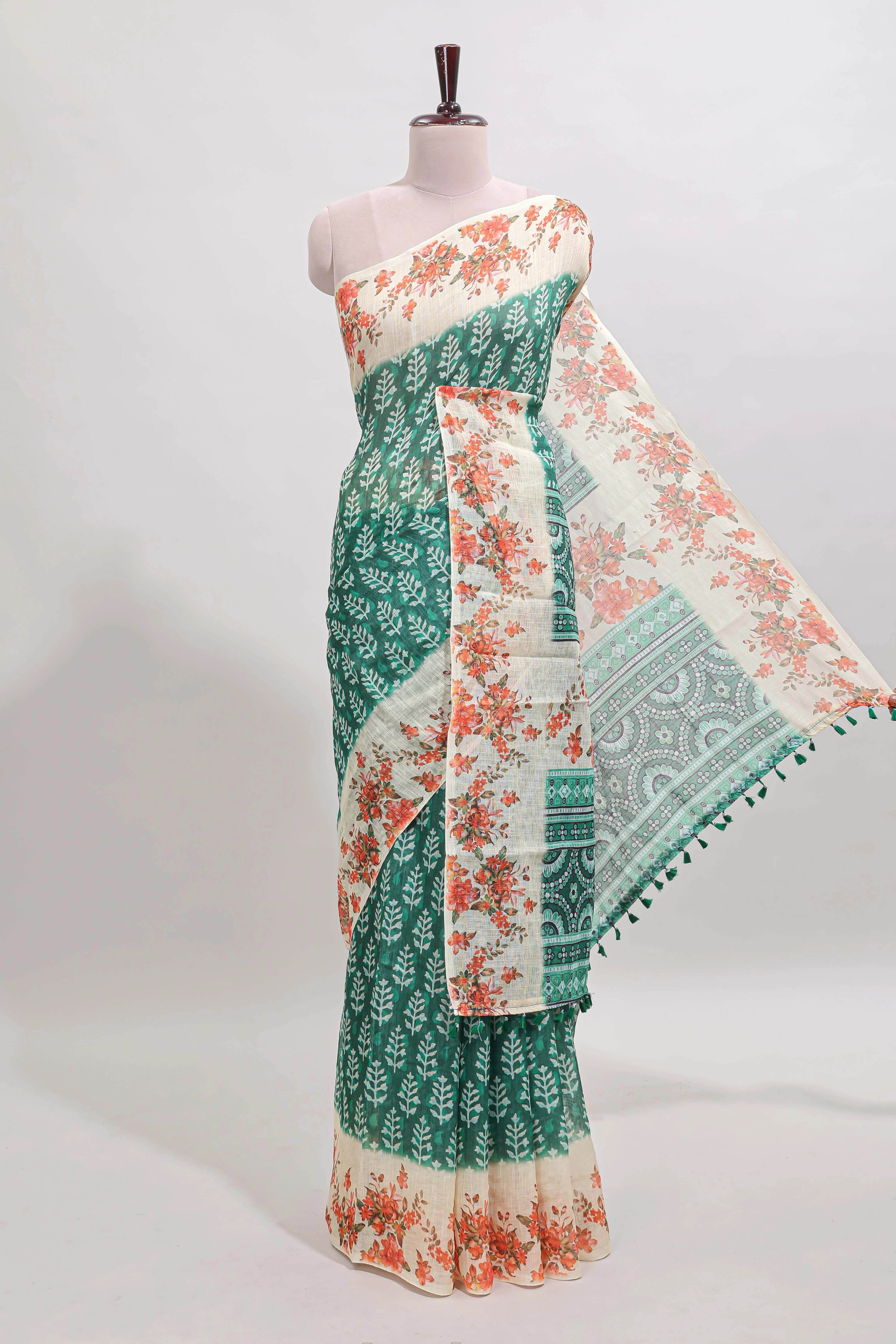 Green leaf design linen cotton saree with contrast floral design border and matching blouse