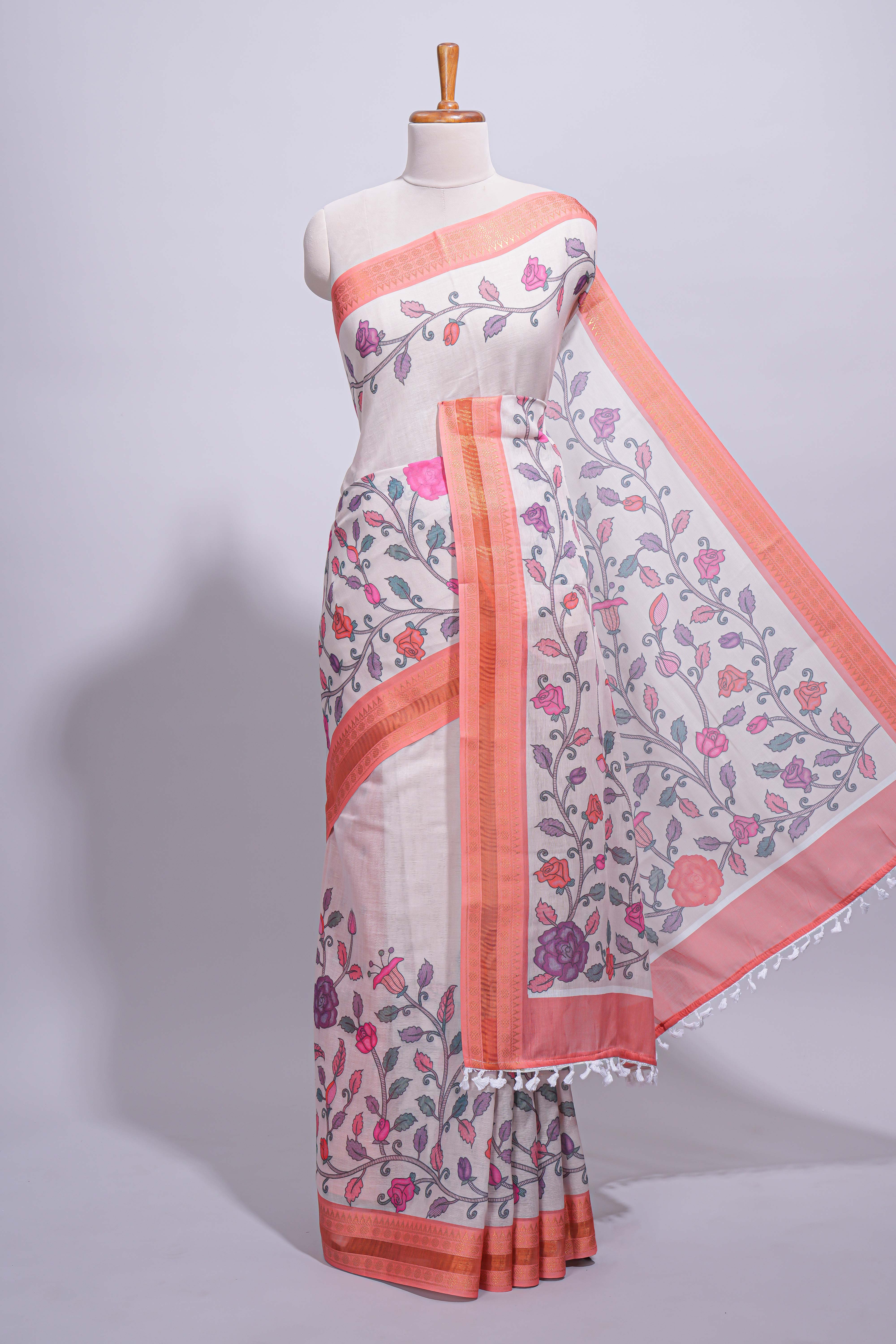 Ivory with orange linen cotton saree with multicolour floral vine print with a contrast border and printed pallu along with printed blouse - Image 2