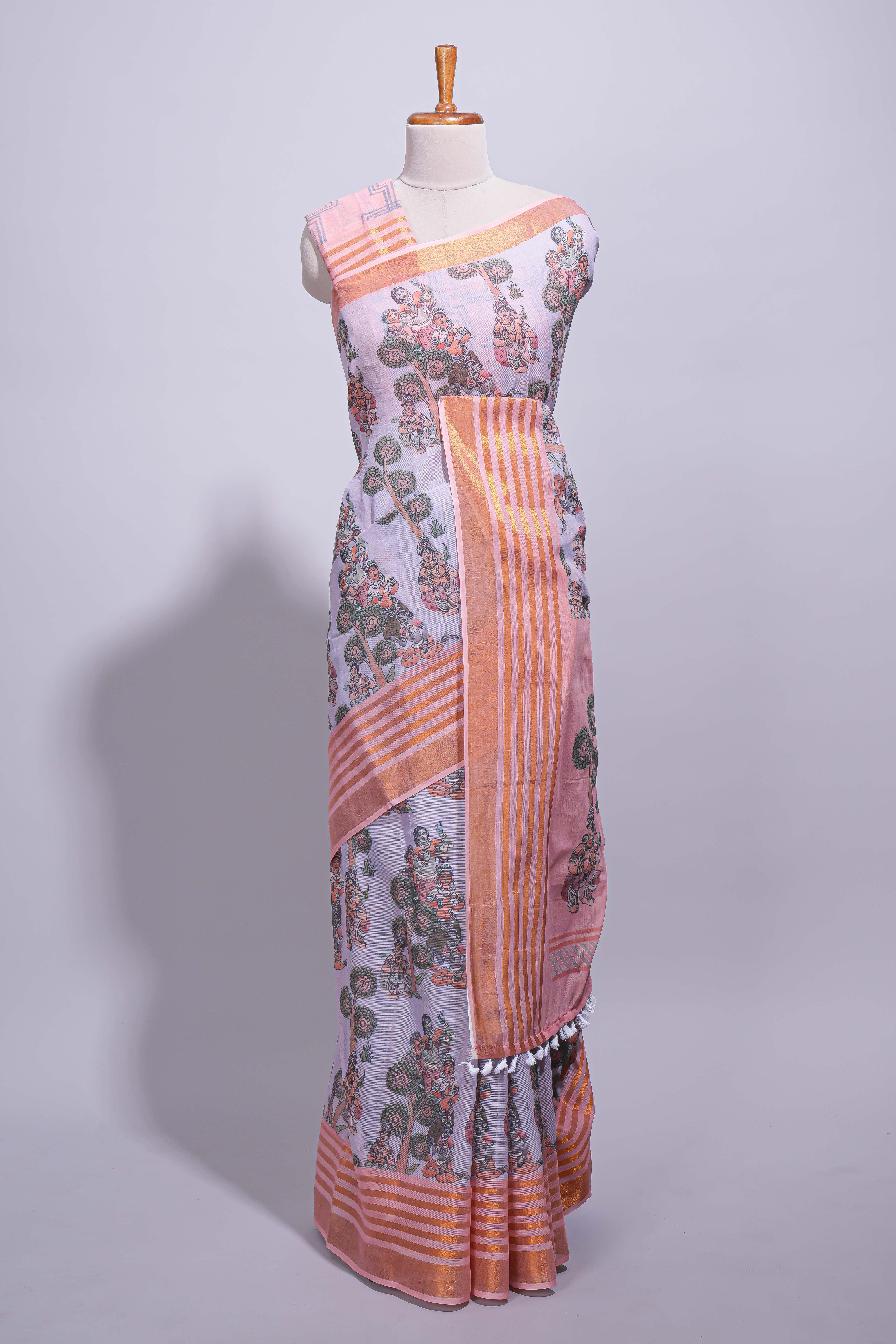Lavender linen saree with body floral and traditional motifs with a contrasting pallu striped zari border and tassel along with contrast blouse