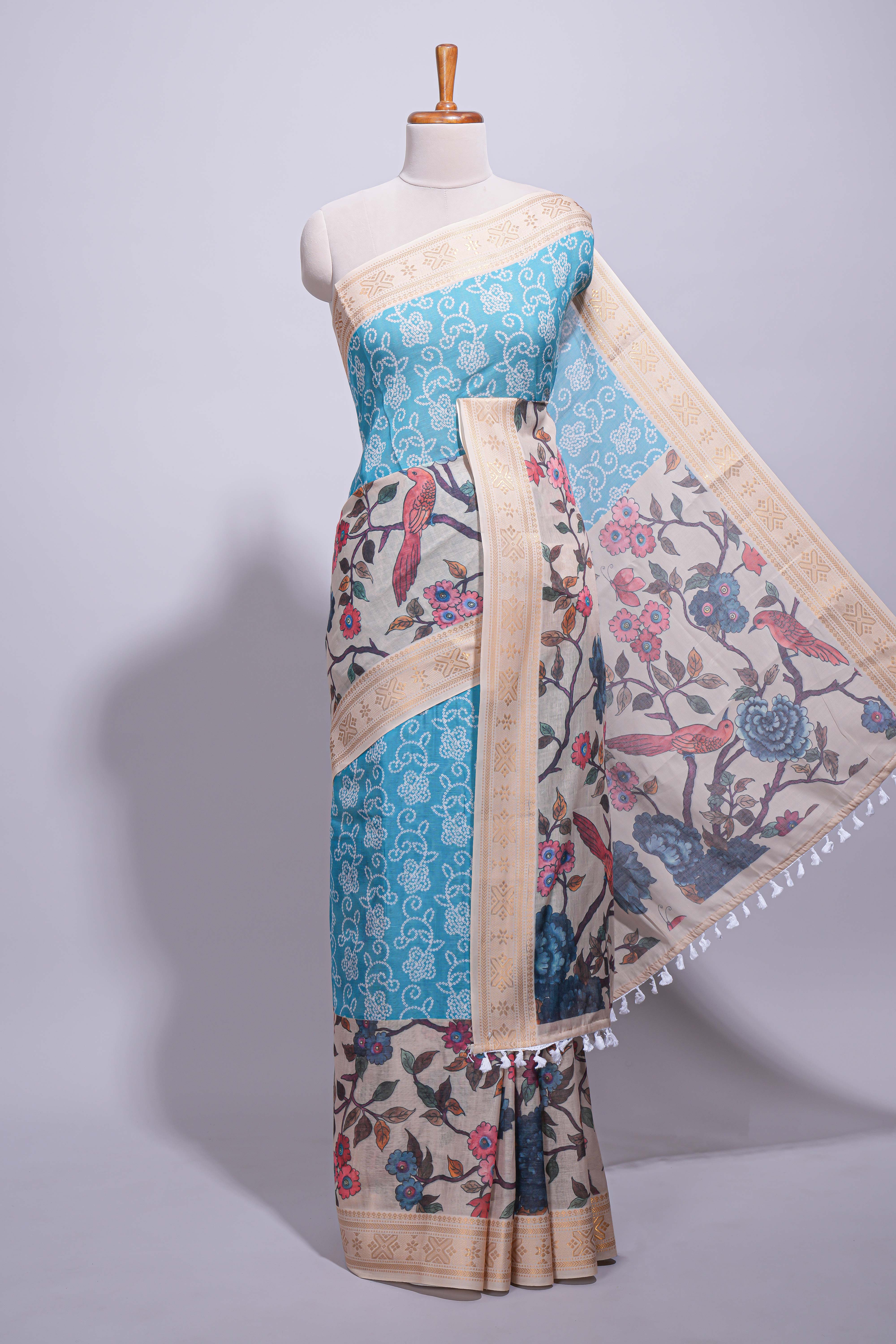 Linen saree with a blue with beige featuring floral patterns with a contrast  floral printed pallu and zari border with tassel - Image 2