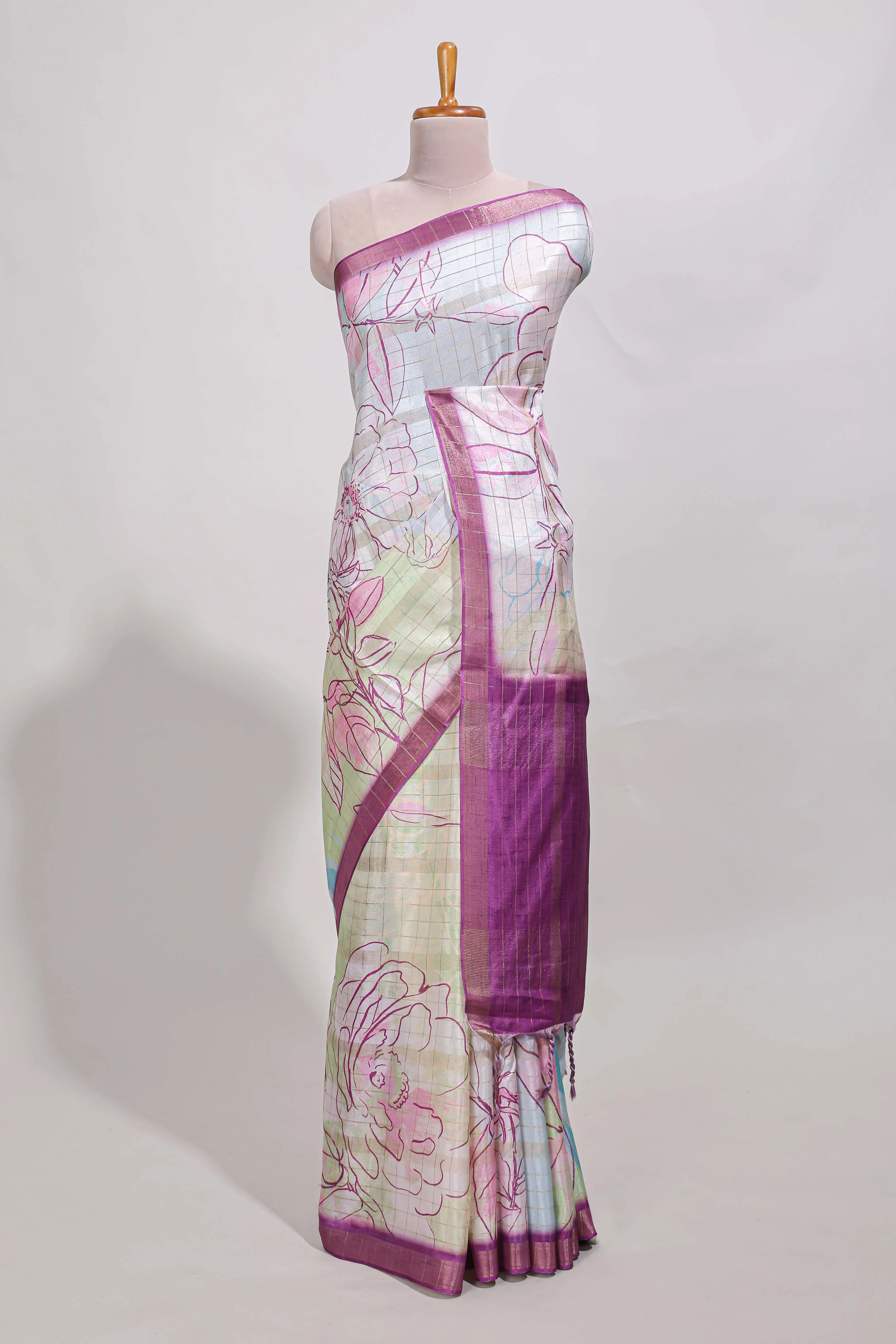 Multi colour and floral design semi tussar saree with contrast border and contrast blouse