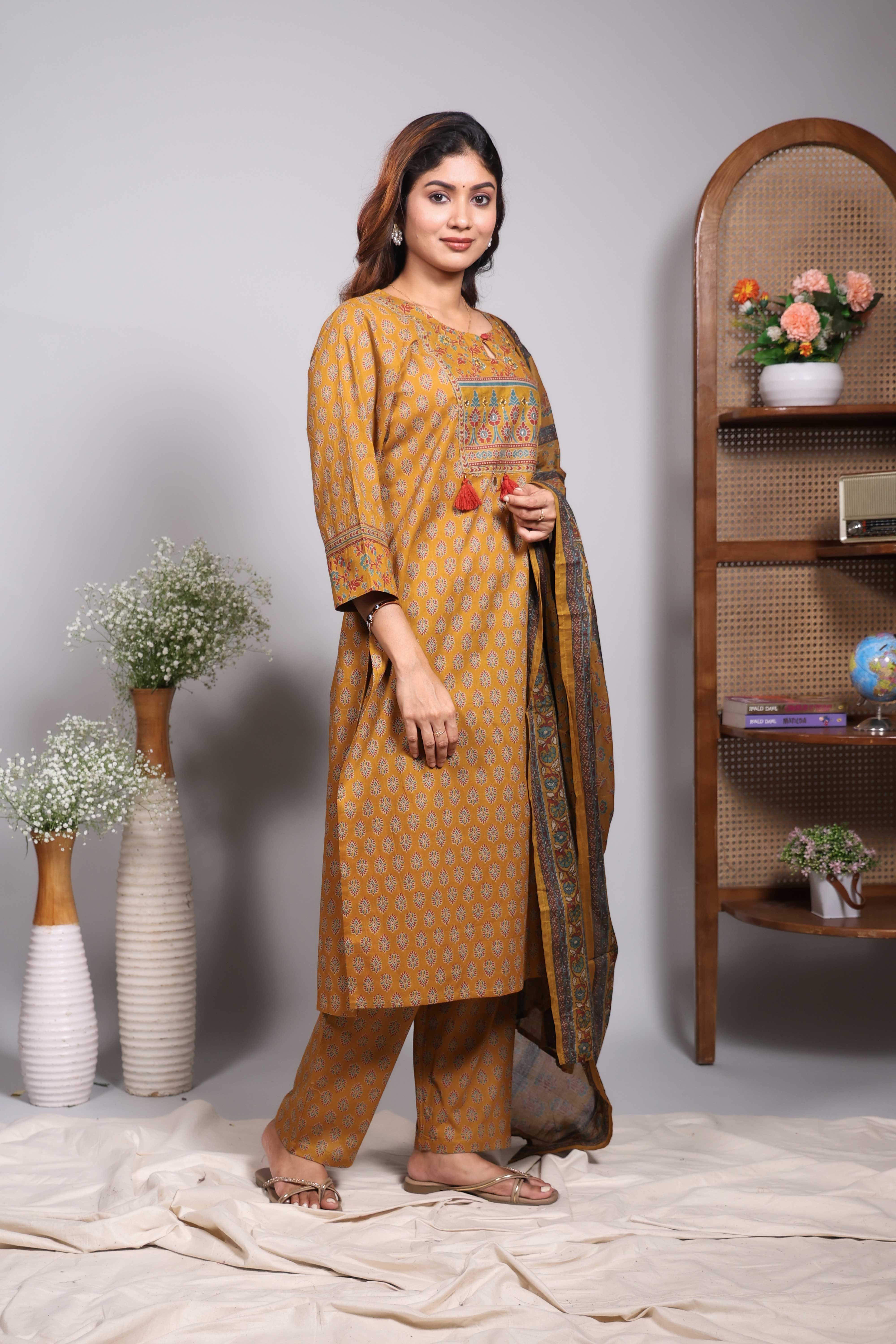 Mustard floral motifs design round neck salwar set with 3/4th sleeve, self bottom and matching dupatta - Image 4