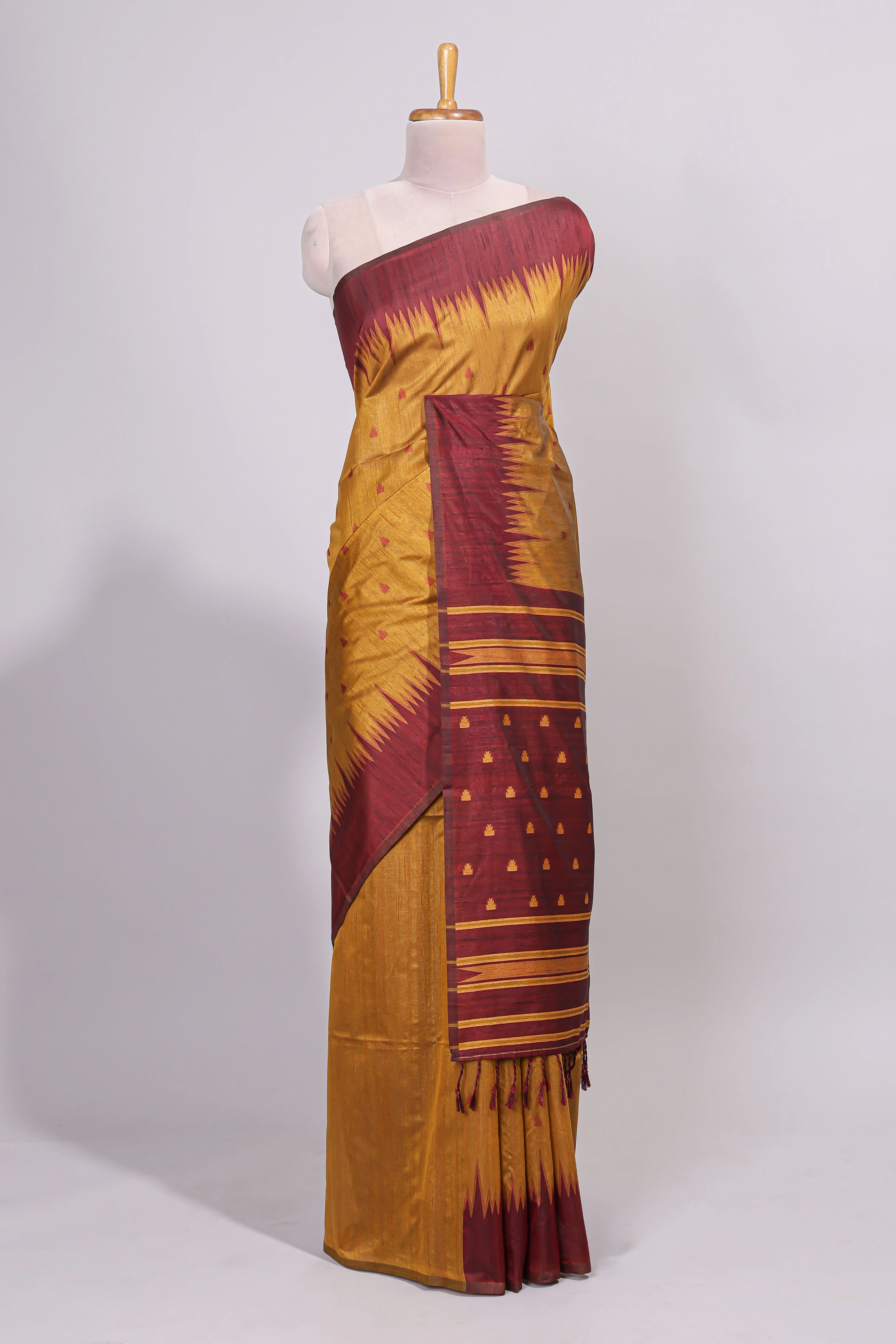 Mustard ikkat motifs design semi tussar saree with contrast border and striped blouse - Image 2