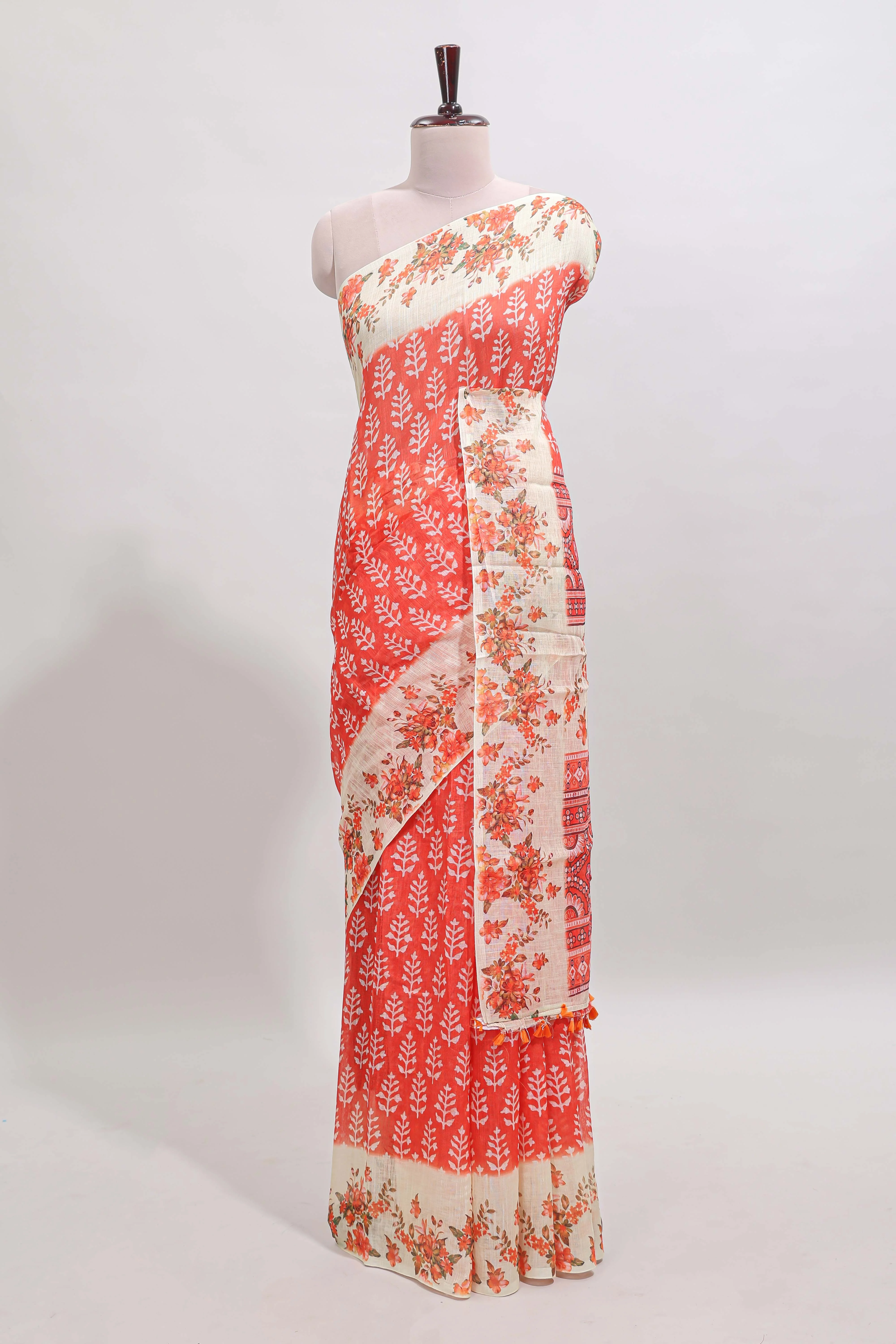 Orange leaf design linen cotton saree with contrast floral design border and matching blouse - Image 2