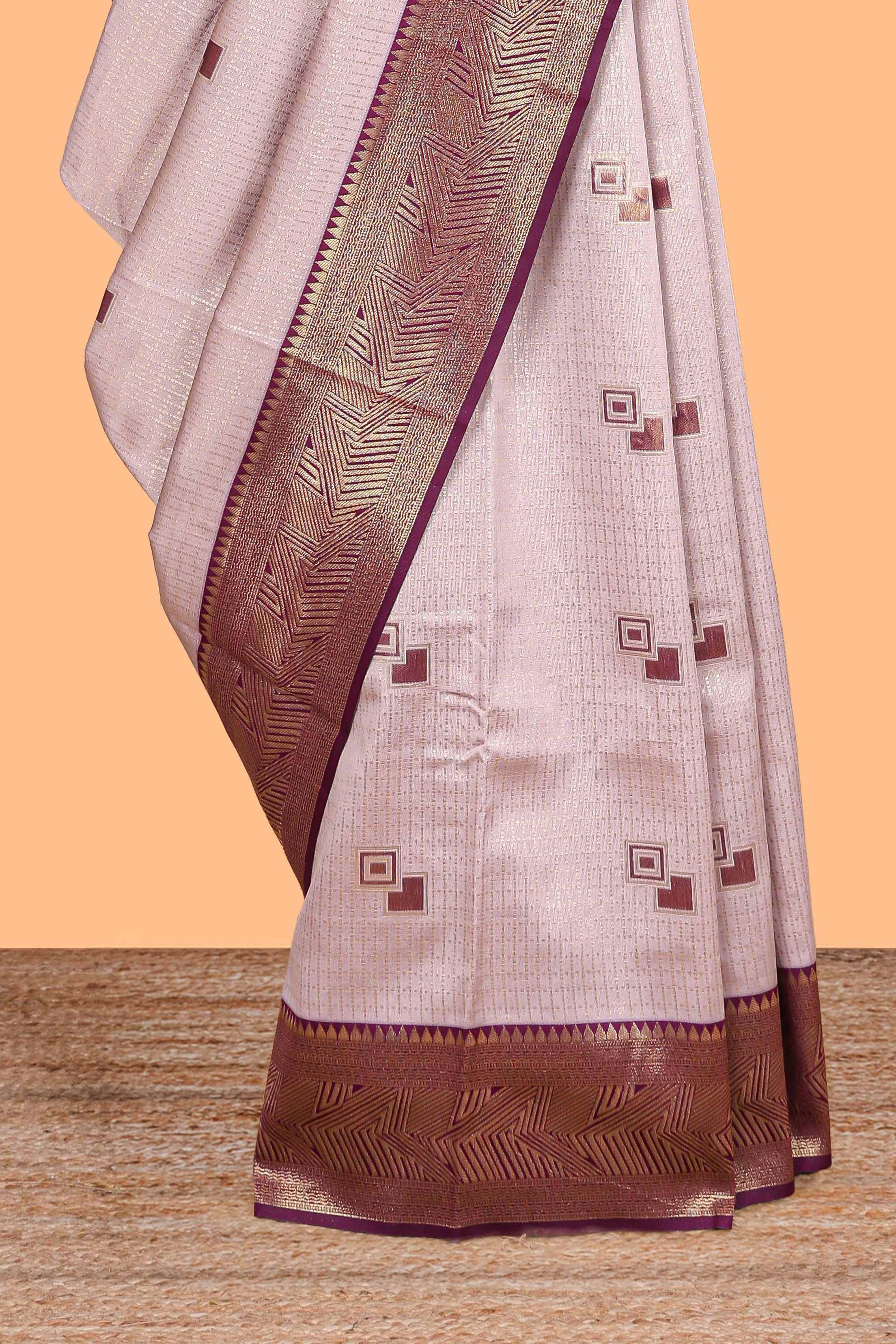 Pale pink checked geometric design litchi silk saree with contrast zari border and blouse - Image 3