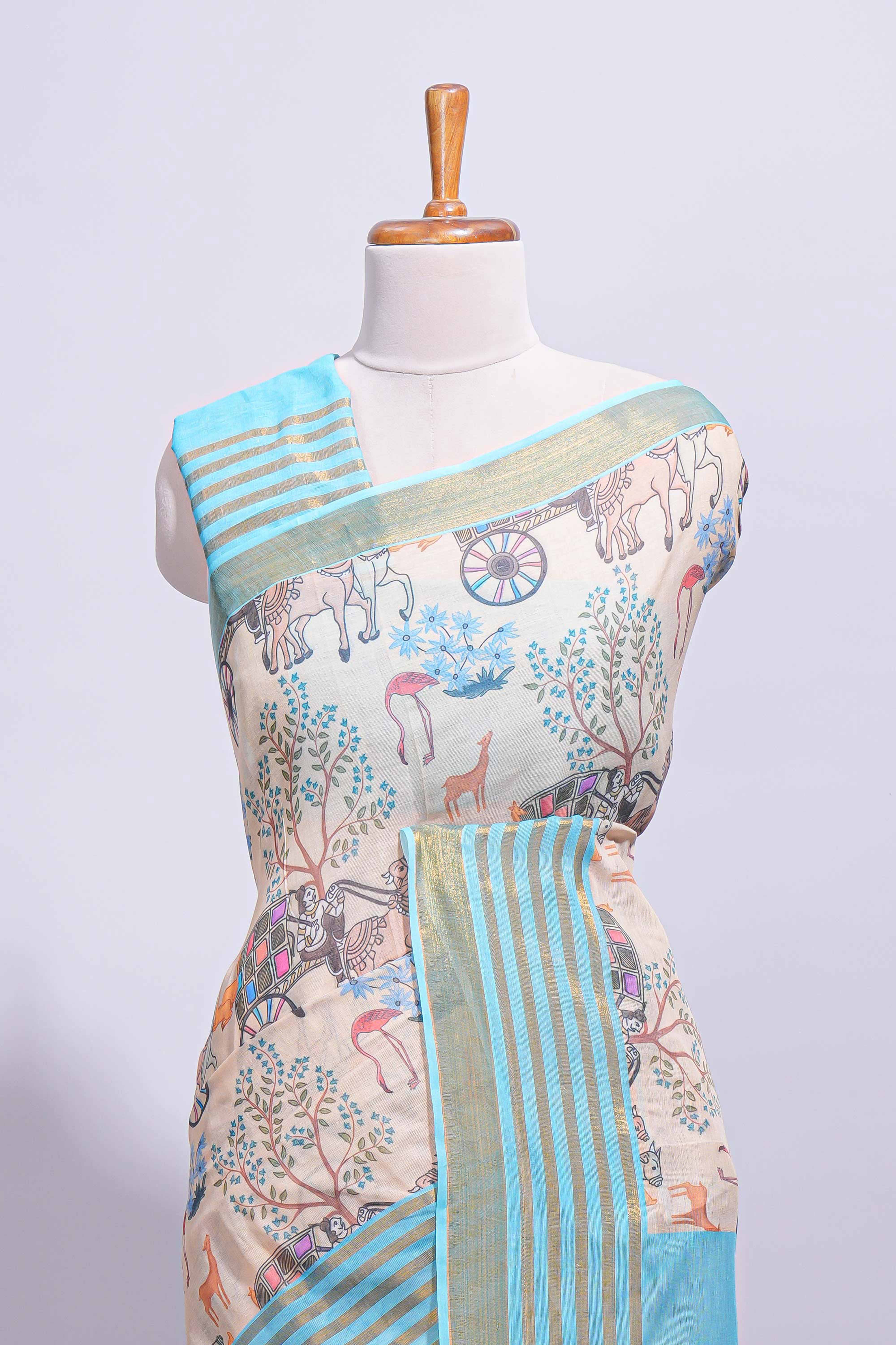 Pastel blue and beige linen cotton saree with animal motifs striped zari border and printed pallu with tassel along with contrast blouse - Image 3