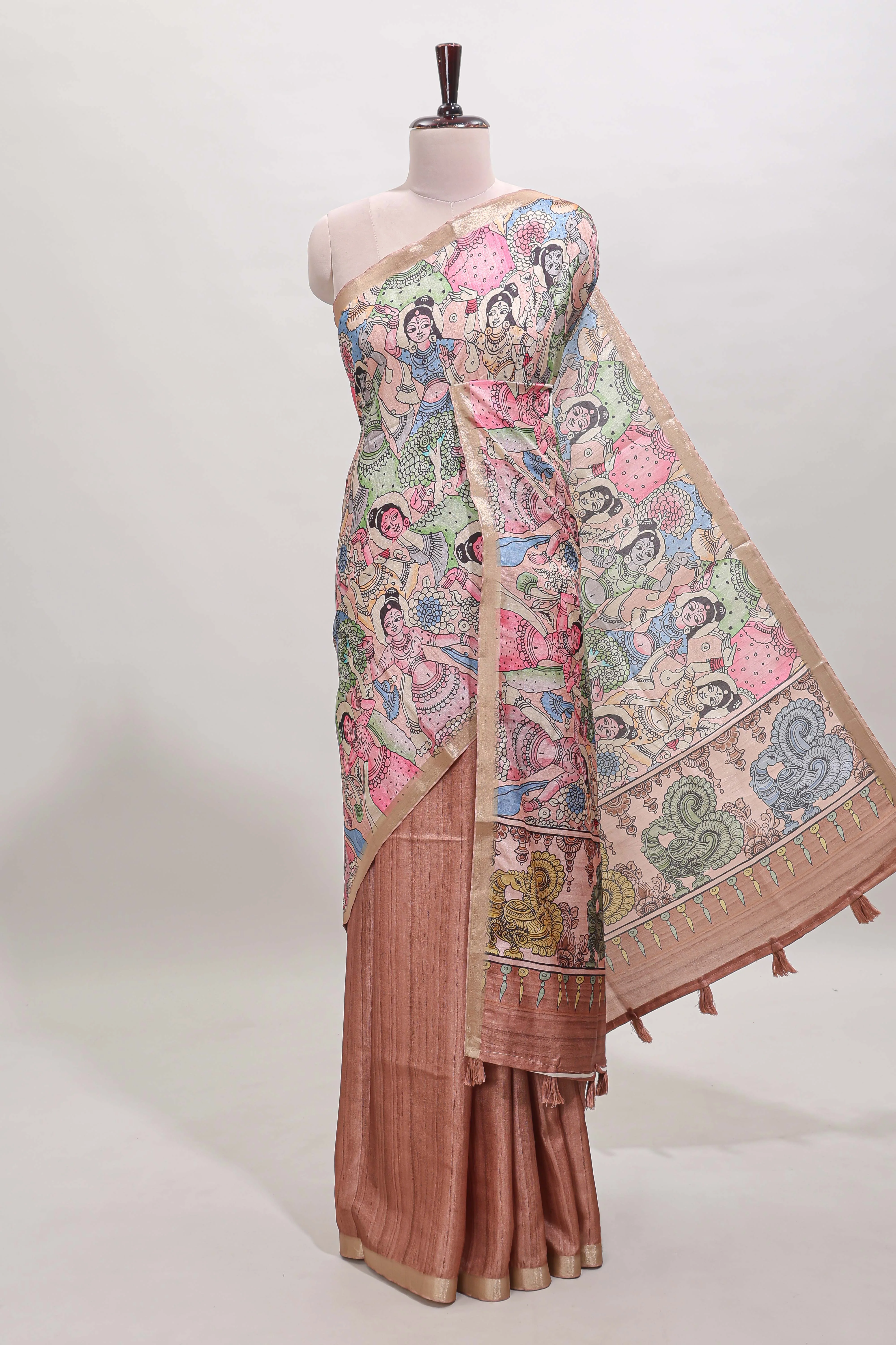 Peach kalamkari style art tussar saree with self zari border and blouse