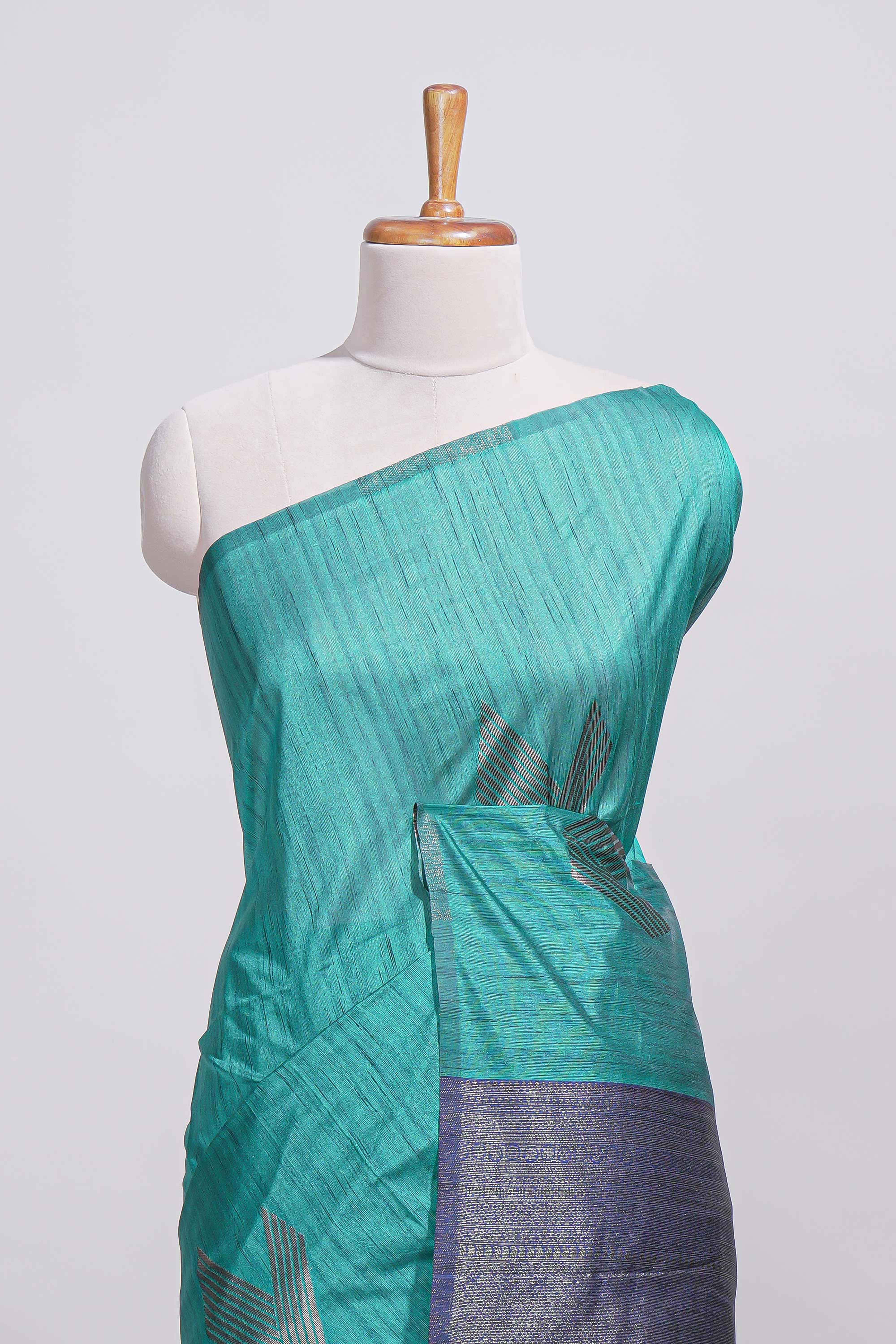 Peacock green tussar saree with subtle silver woven motifs paired with a rich zari pallu with tassels with contrast blouse piece - Image 3