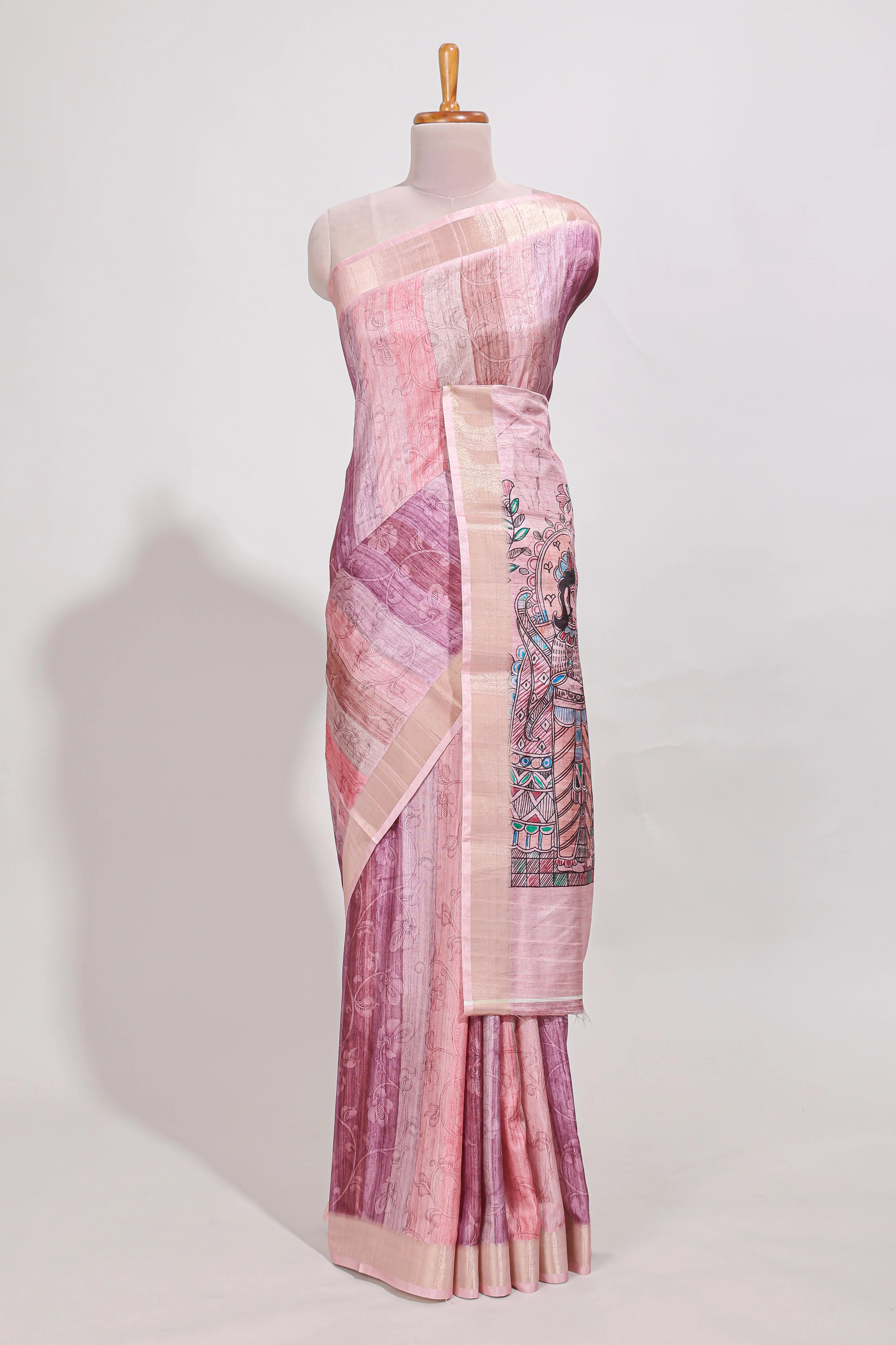 Pink colour kalamakri art tussar saree with floral creeper prints zari border and kalamkari motif print pallu