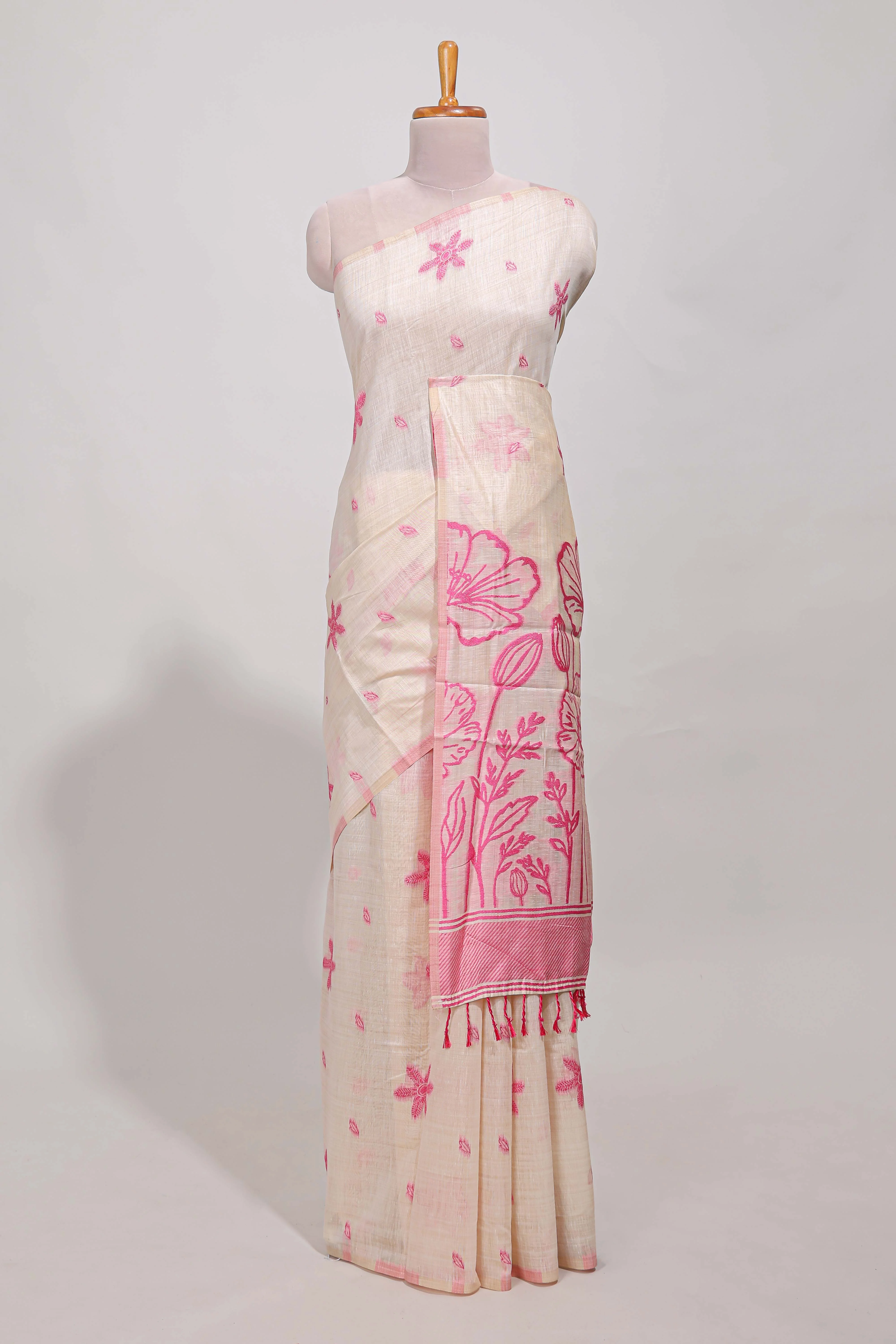 Pink floral print munga cotton saree with matching floral print pallu along with tassles