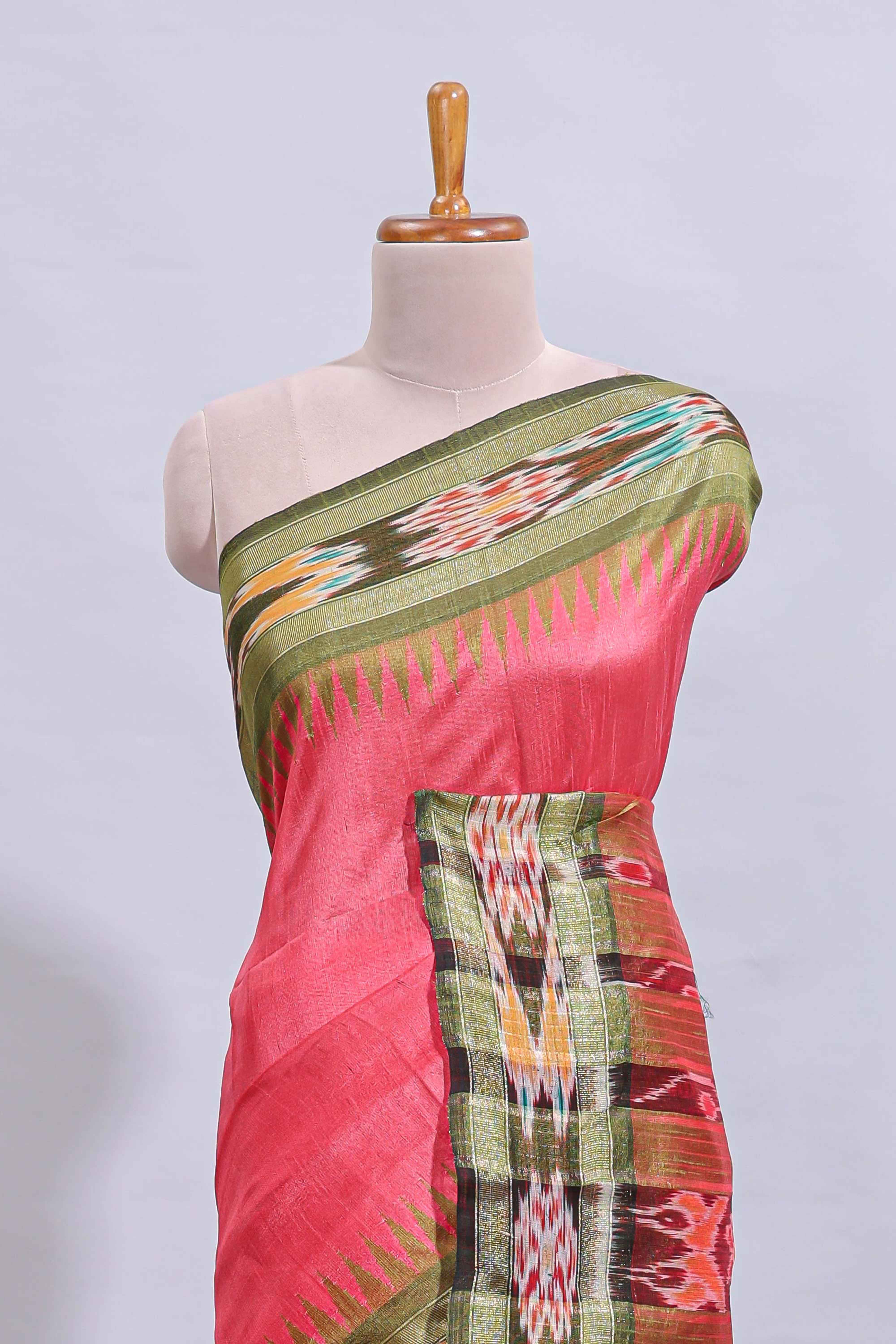 Pink plain art tussar saree with contrast ikkat style border and floral design striped pallu - Image 3