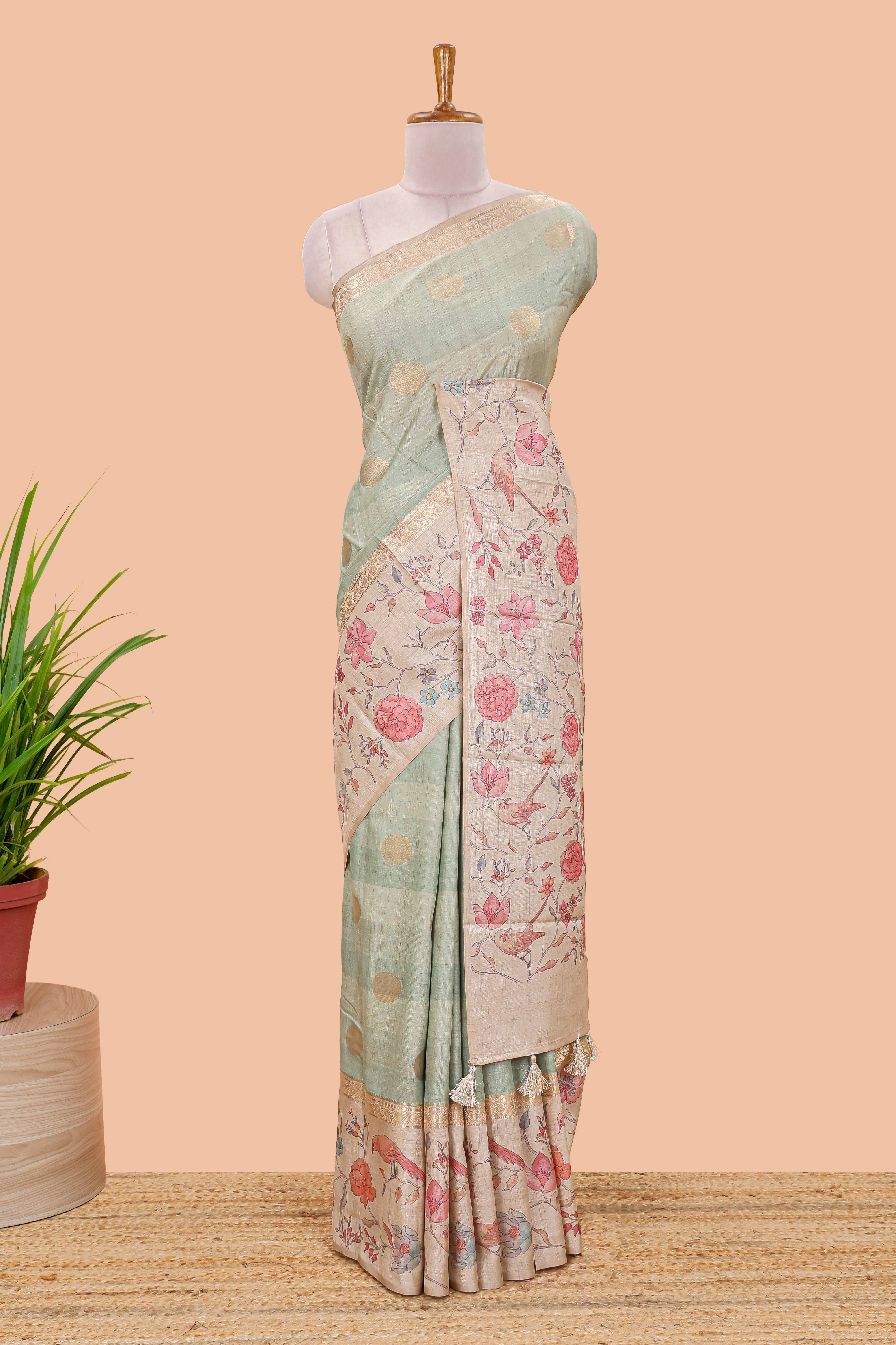 Pista green art tussar saree featuring round zari butta body with floral and bird motif printed border and pallu - Image 2