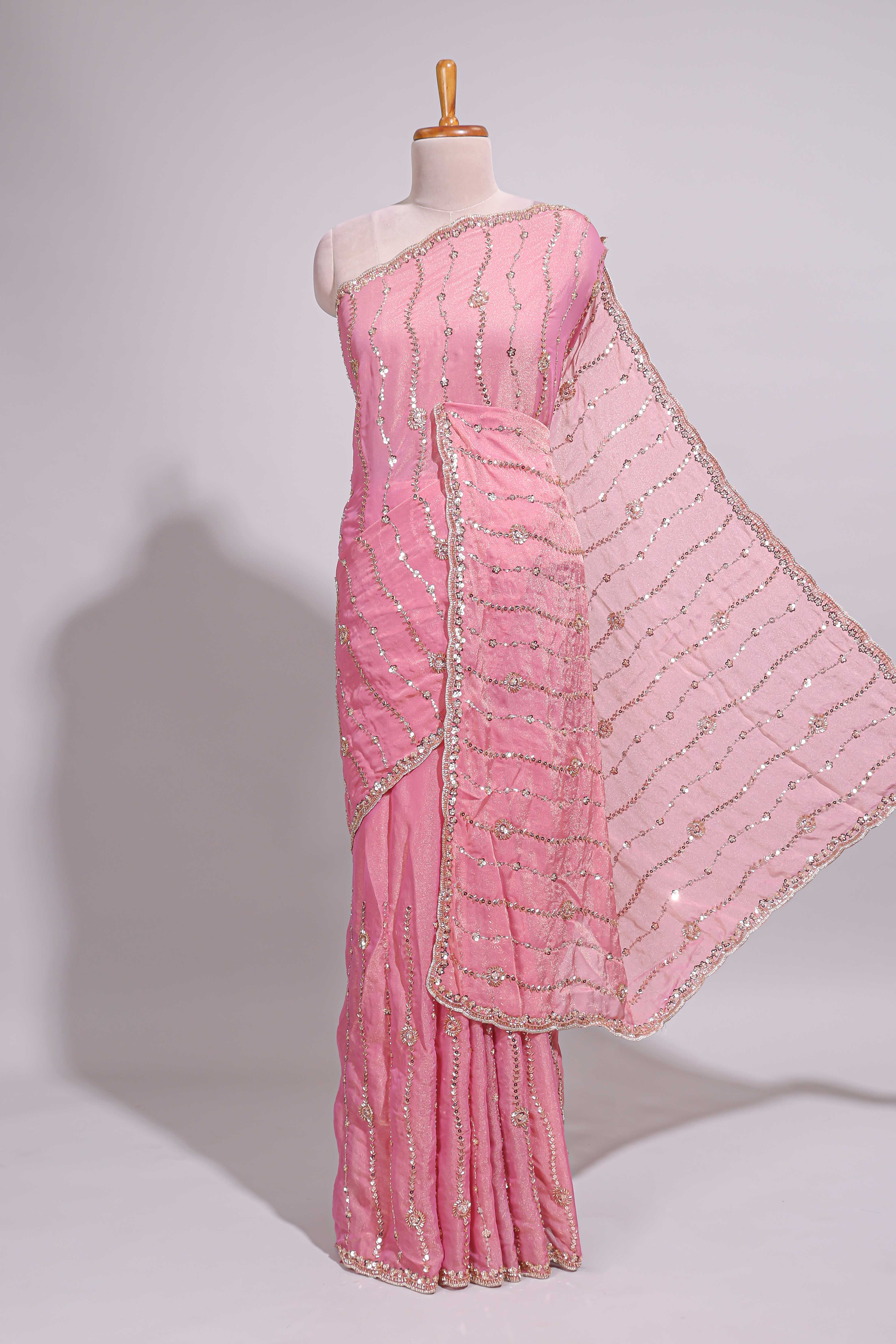Baby pink saree with silver sequin wavy line embroidery floral motifs and a sparkling embellished border along with matching blouse - Image 2