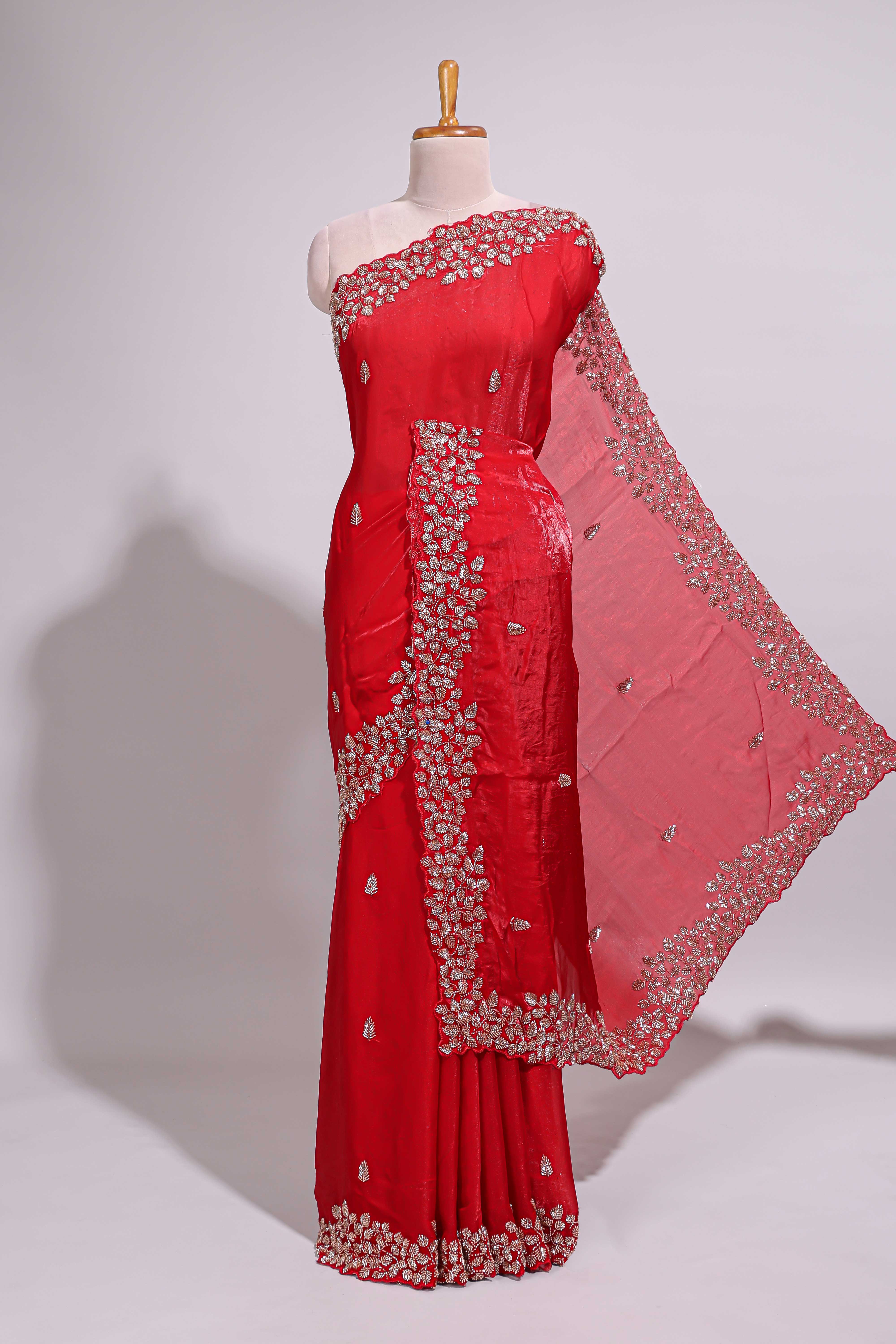 Bright red saree with elegant golden floral embroidery and a rich embellished border along with matching blouse - Image 2