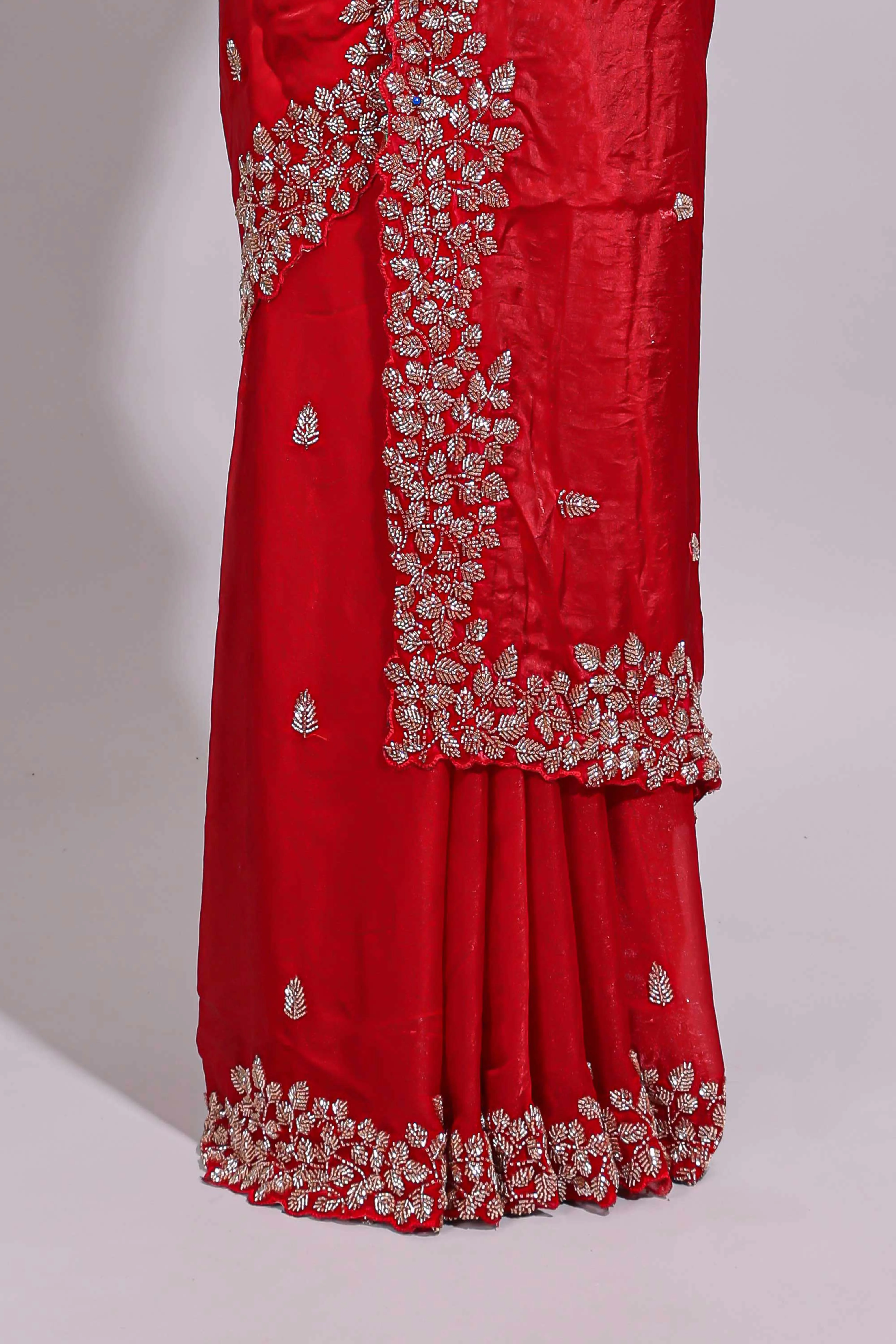 Bright red saree with elegant golden floral embroidery and a rich embellished border along with matching blouse - Image 4