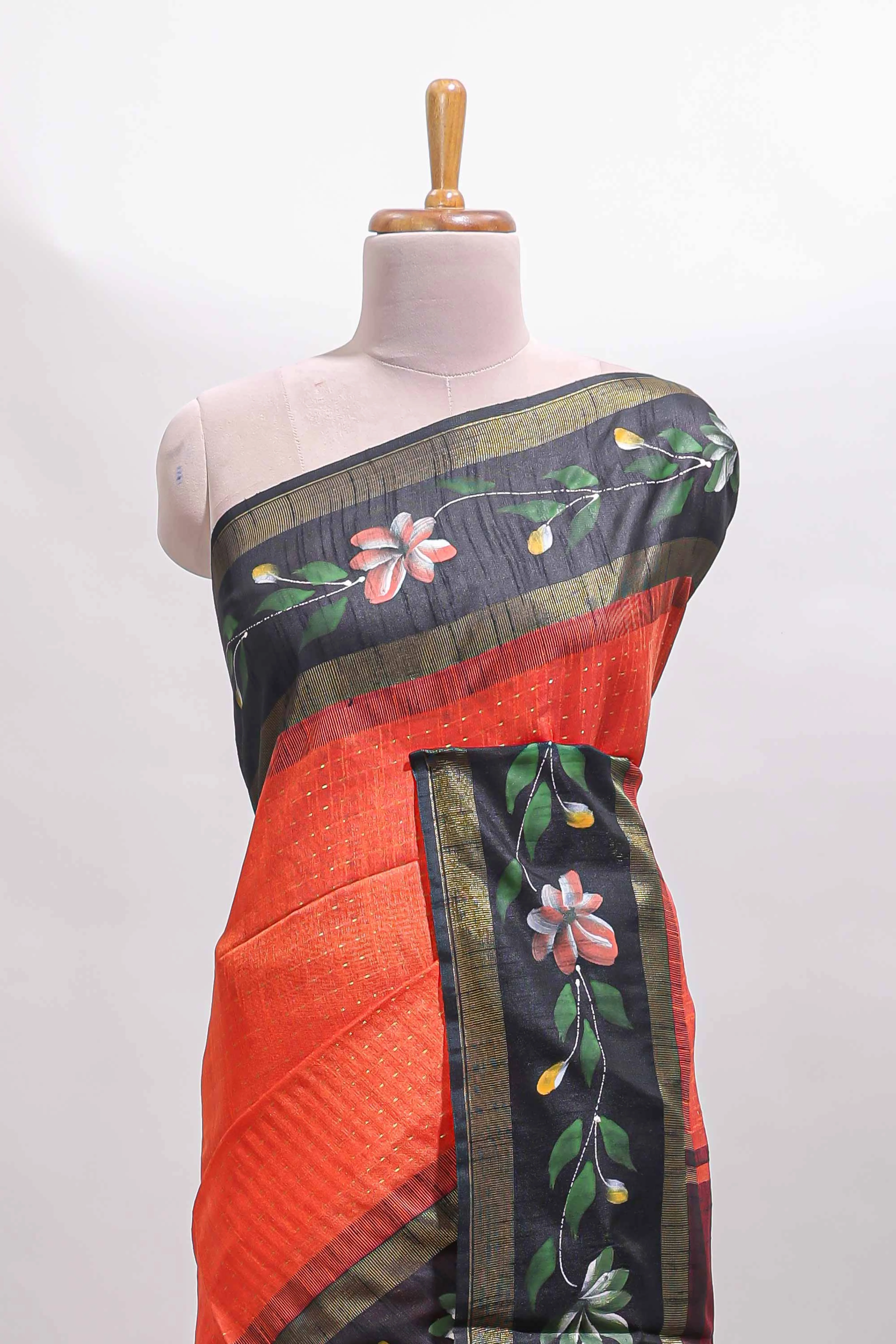 Orange zari design tussar saree with contrast floral print border and blouse - Image 3