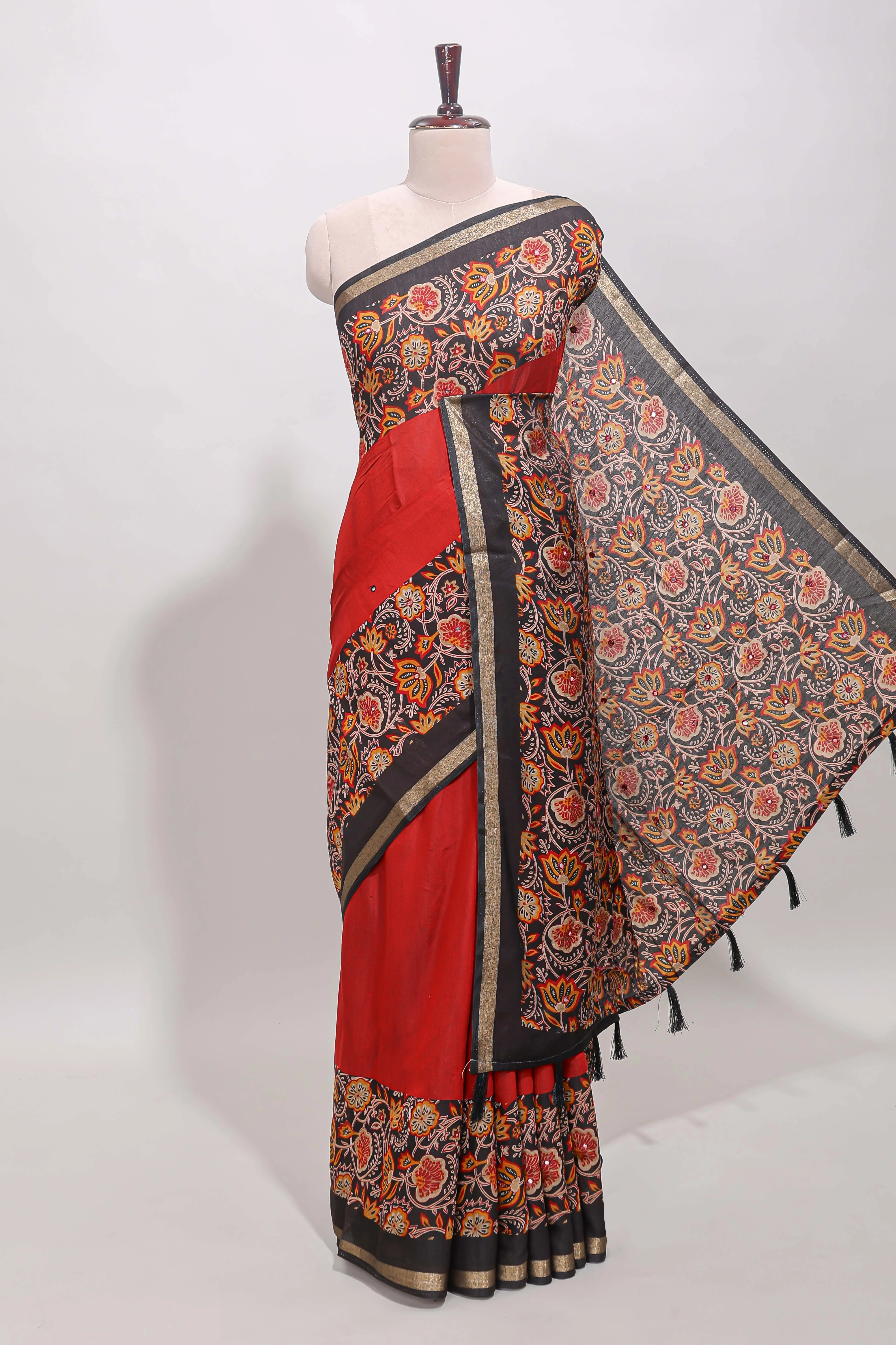 Red embroidery mirror work viscose georgette saree with contrast floral vine zari border and printed blouse
