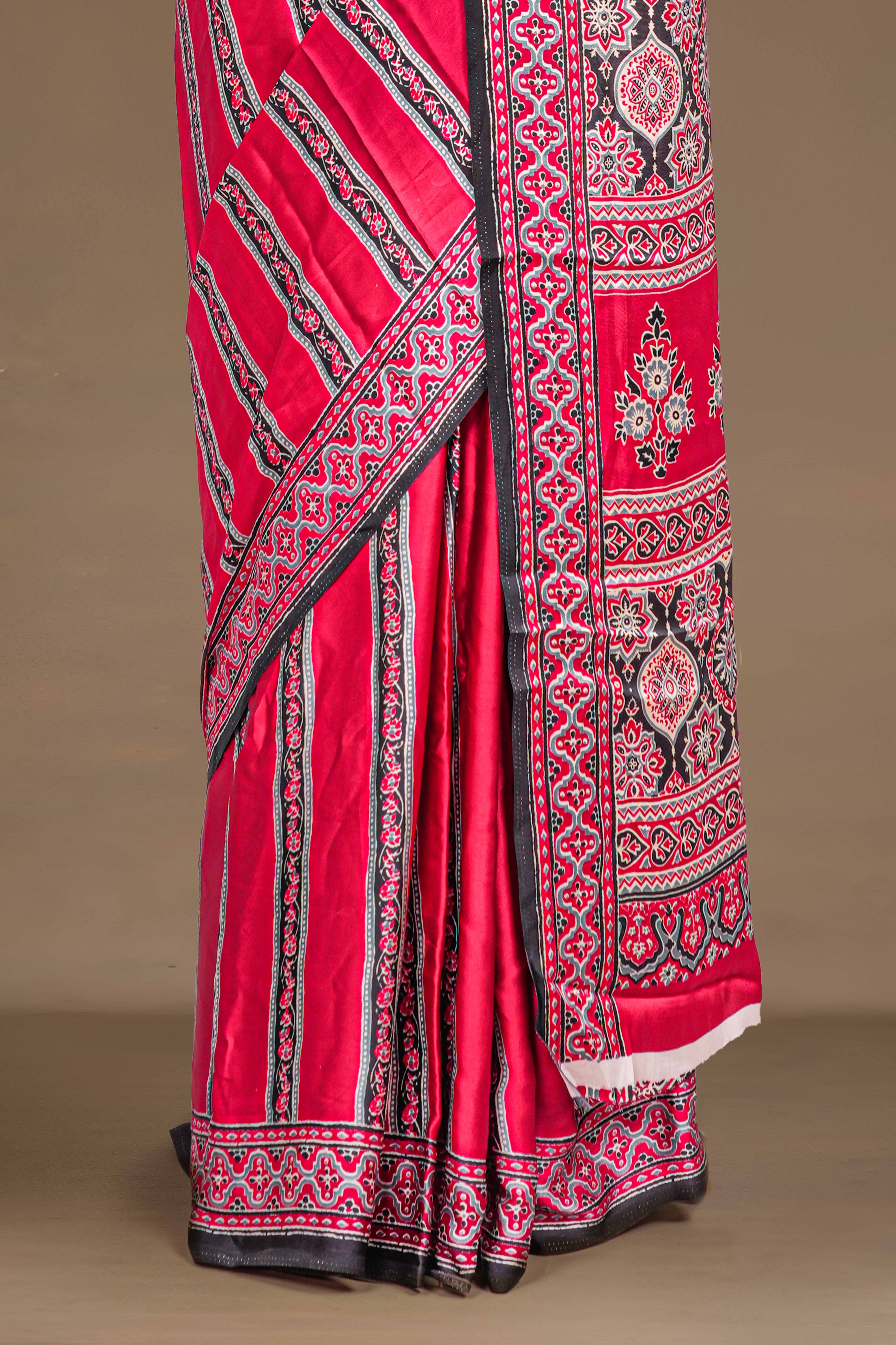 Red Modal Silk Saree The Body Has Ajrakh Design The Pallu Are Highlighted Vibrant Red Printed Along With Ajrakh Print Blouse - Image 4