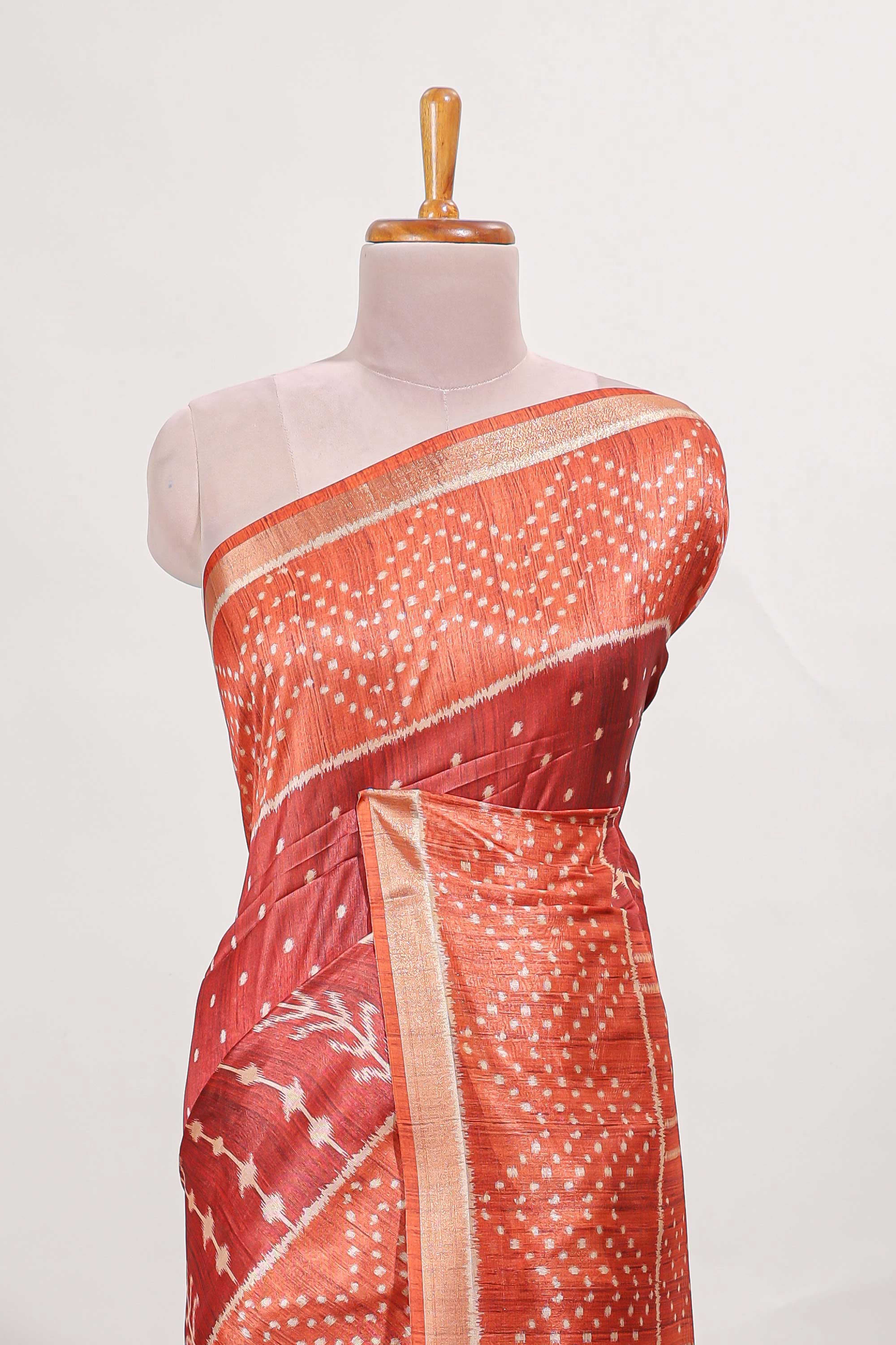Rust maroon tussar saree all over body ikkat print with contrast small zari border , bandhani print pallu and ikkat contrast blouse - Image 3