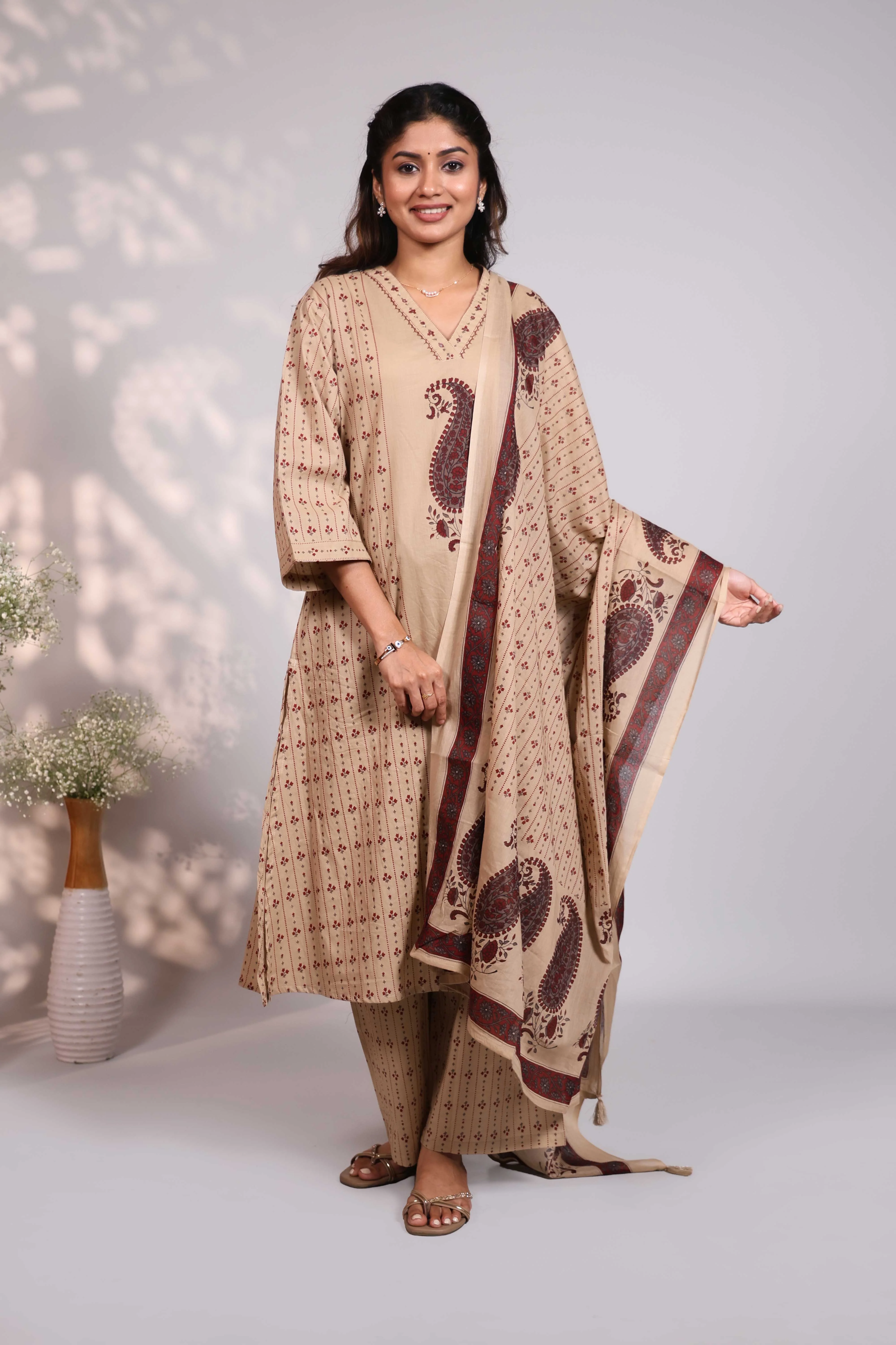 Brown striped floral design V neck salwar set with 3/4th sleeve, self bottom and matching dupatta