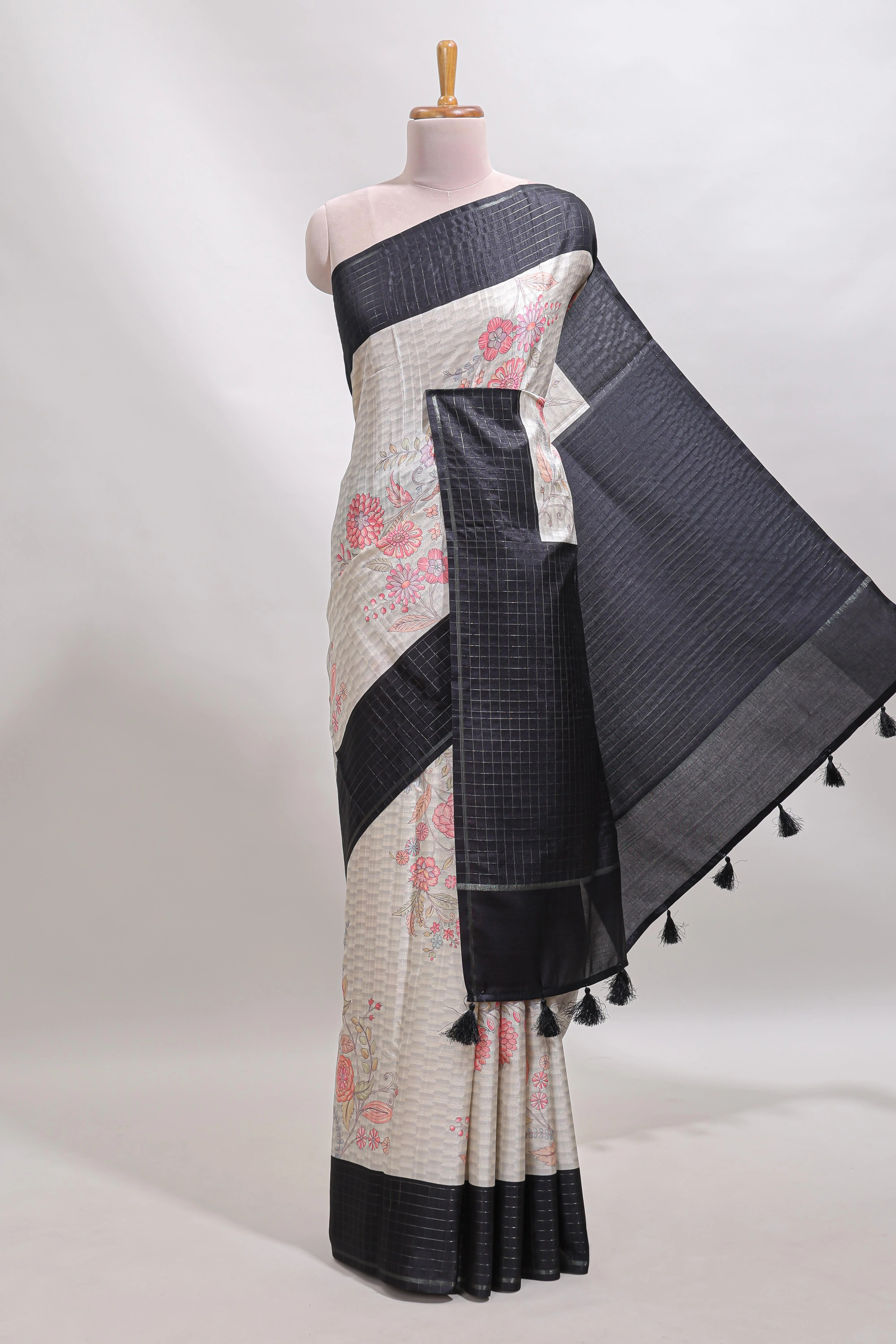 Grey geometric floral design tussar saree with contrast border and floral print blouse