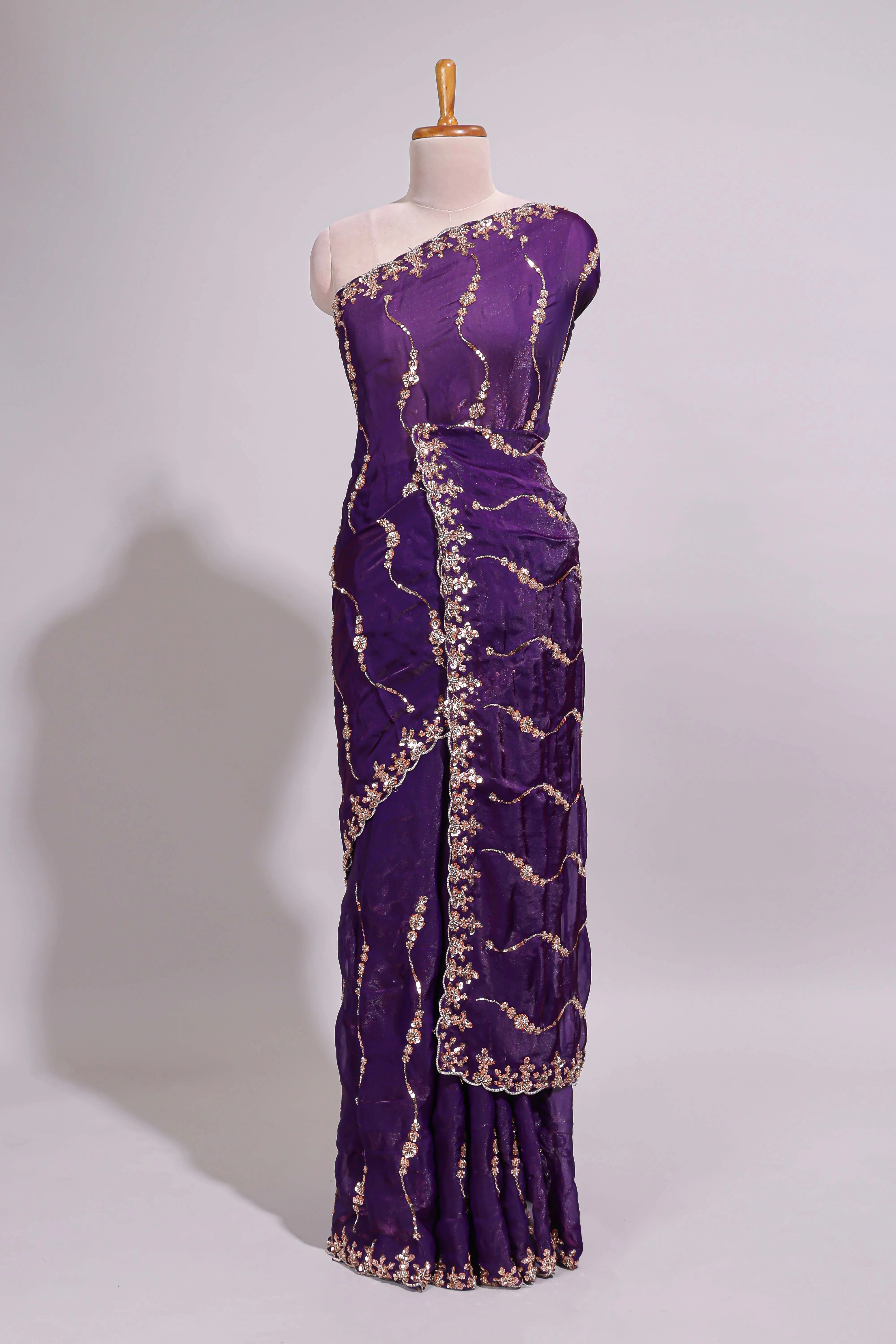 Purple saree with gold sequin wave pattern floral embellished border and matching designer pallu along with work blouse