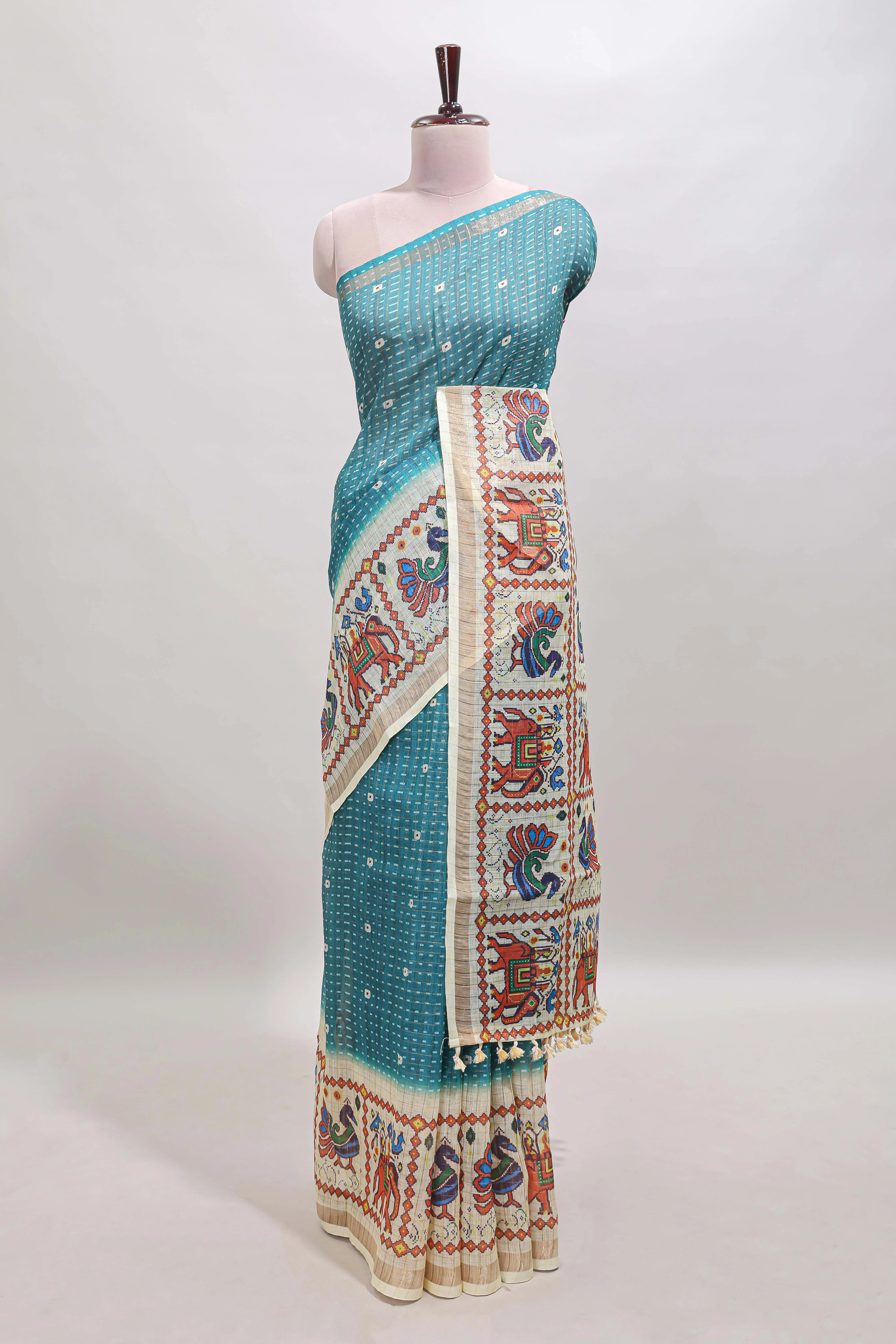 Turquoise blue checked geometric motifs linen cotton saree with contrast ikkat style border and blouse - Image 2