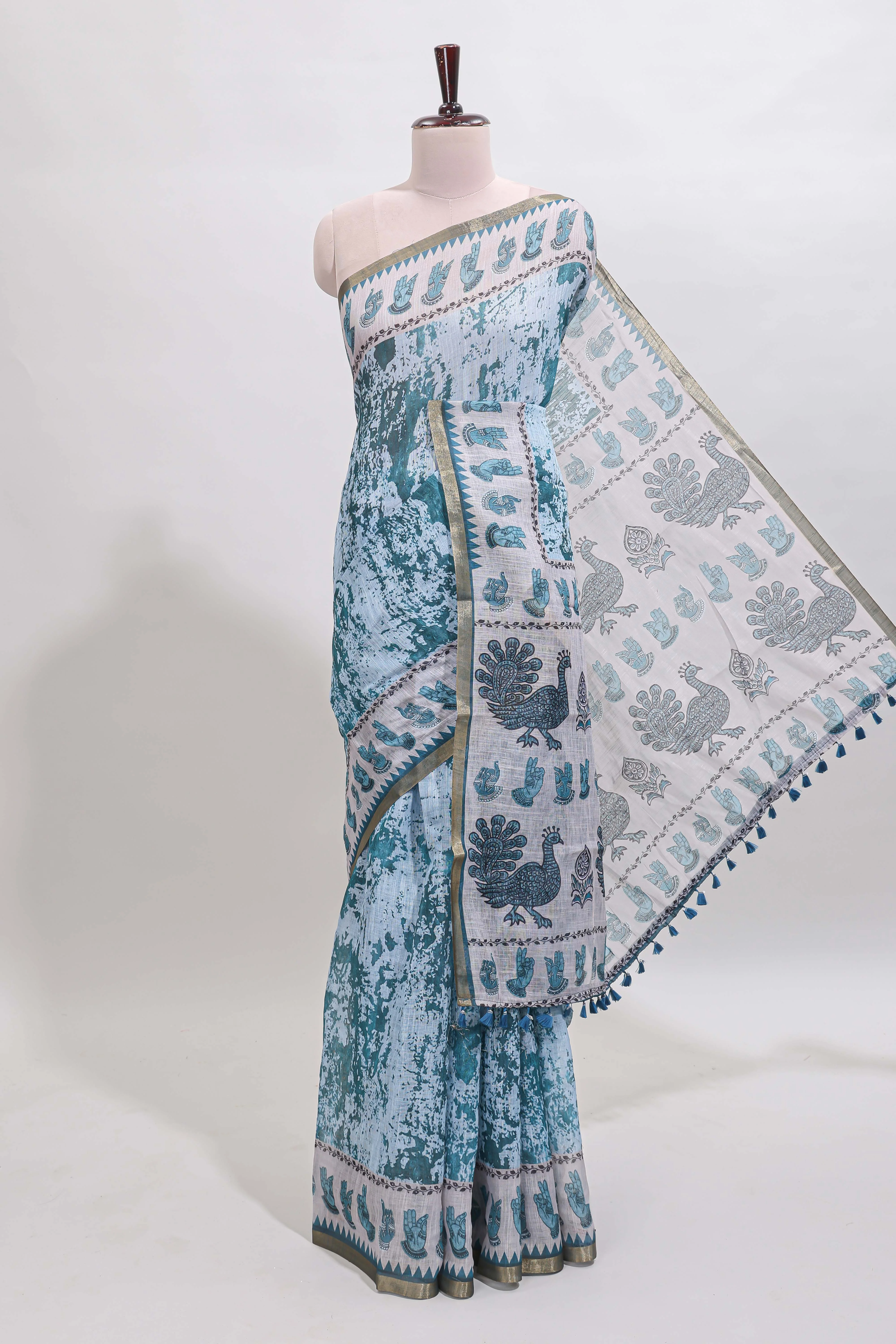 Turquoise blue shibori style classical dance muthirai design linen cotton saree with contrast border and blouse
