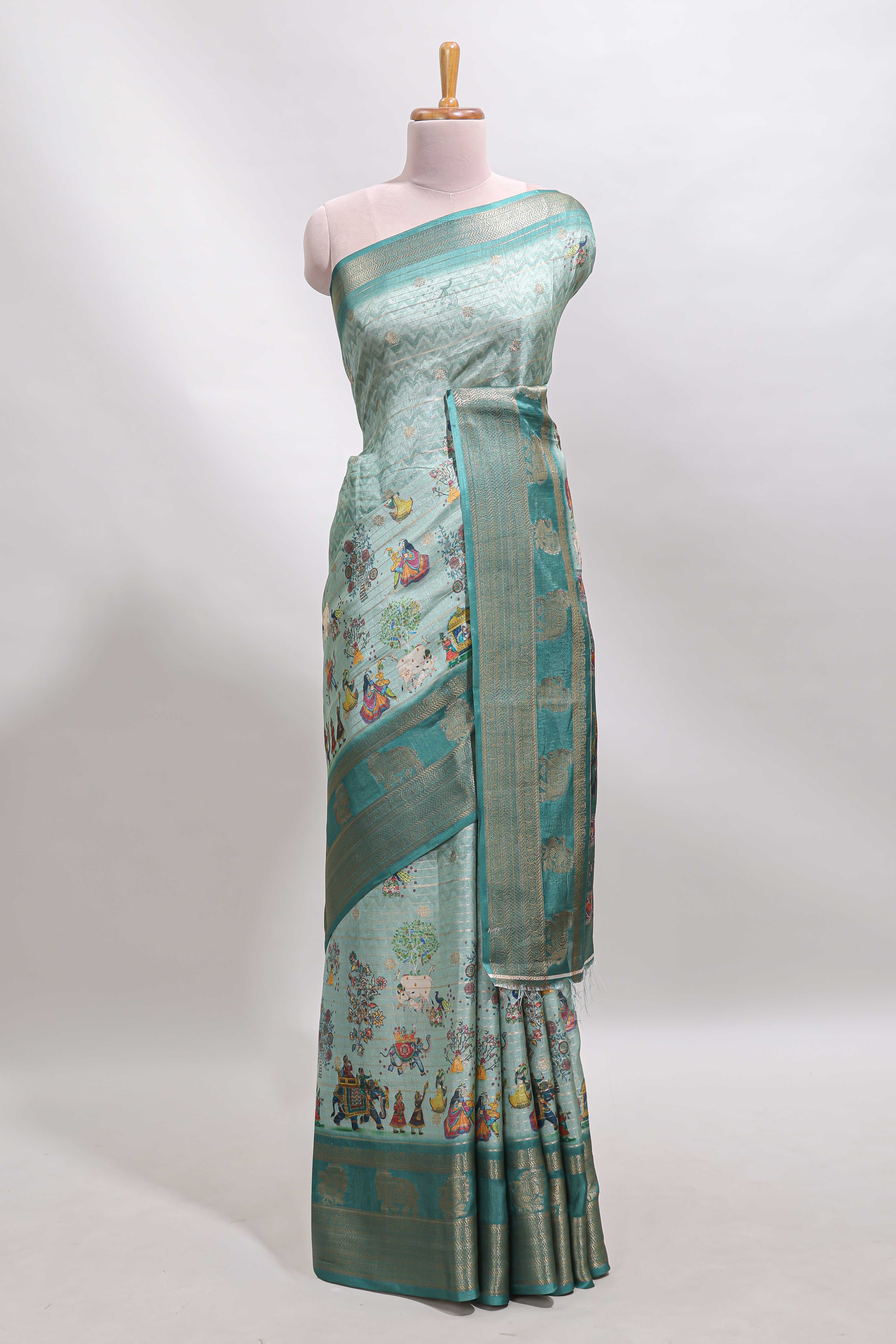 Turquoise green pichwai print tussar saree with contrast zari border and matching blouse - Image 2