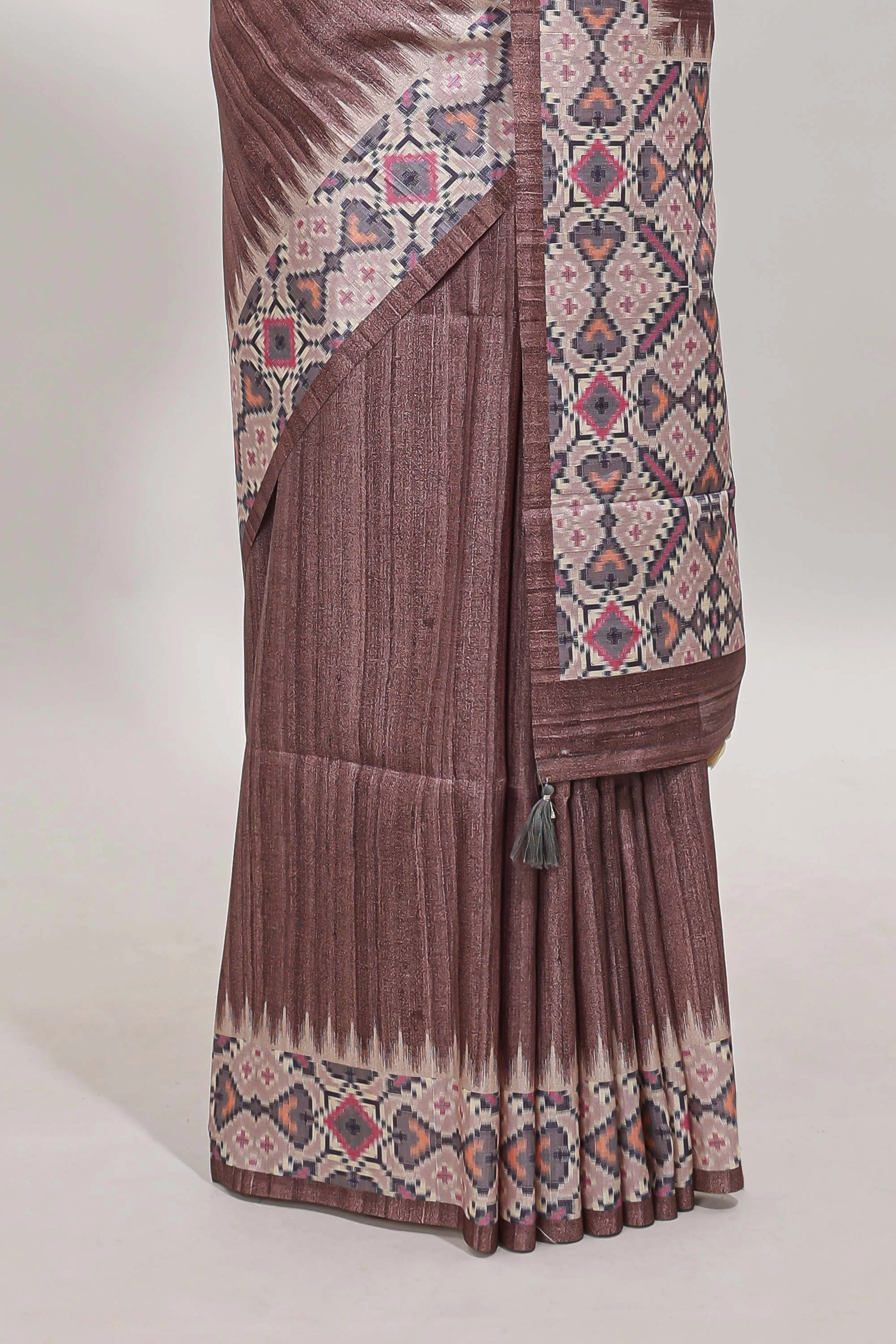 Tussar Silk Saree with a textured mauve body geometric woven border and a designer pallu with tassel along with blouse - Image 4
